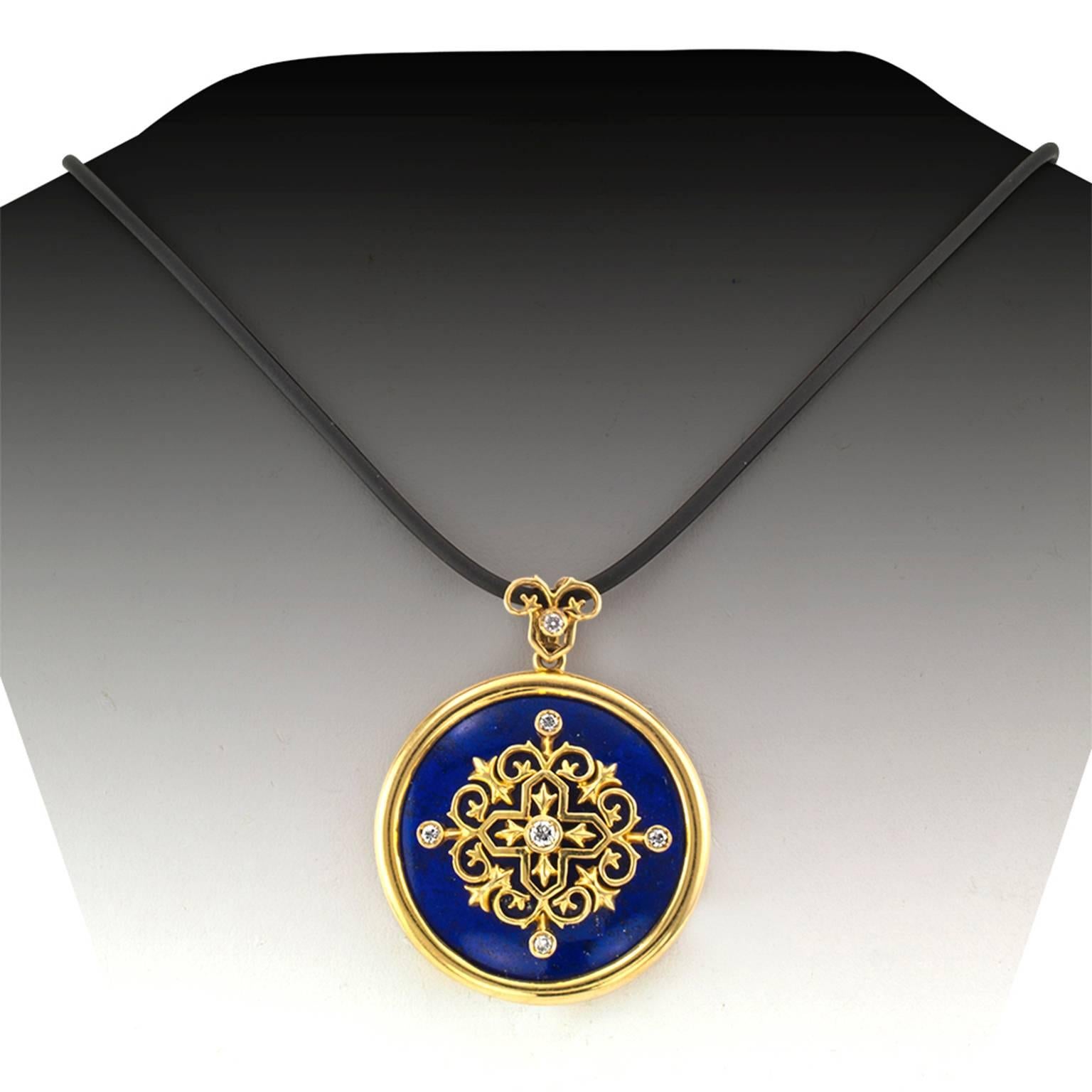 Ilias Lalaounis Estate Lapis and Diamond Gold Pendant

Care free and elegant, evoking a golden Byzantine effect upon the polished surface of the cool and lush, bezel-set  lapis lazuli, centering a similarly-set round diamond, the cardinal points