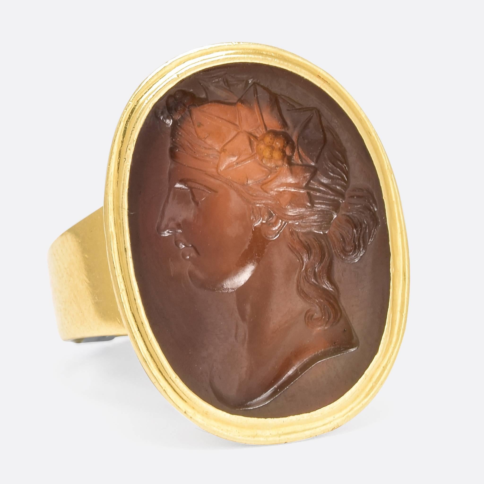 This glorious oversized signet ring is set with an agate panel, carved with an intaglio of Flora - the Roman Goddess of Spring and Flowers. The detail is exquisite, and, rather magically, the 