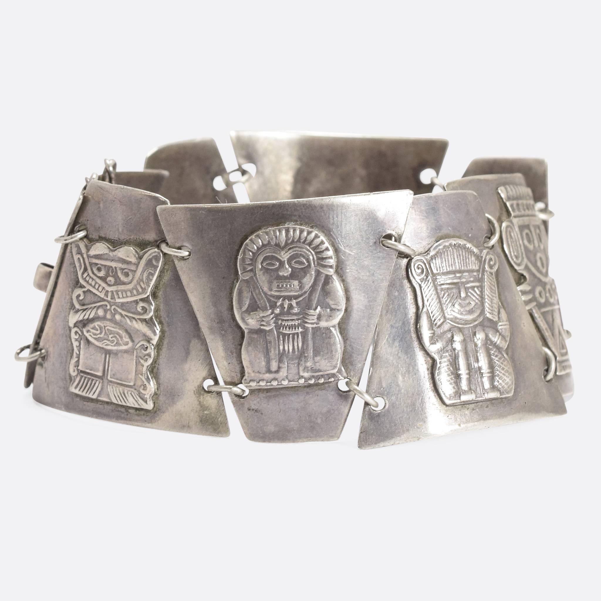 This stylish and unusual silver panel bracelet is furnished with Aztec-themed imagery. Stamped 900 for silver, most likely Mexican origin. Width: 3.0cm - Wearable length: 7 inches