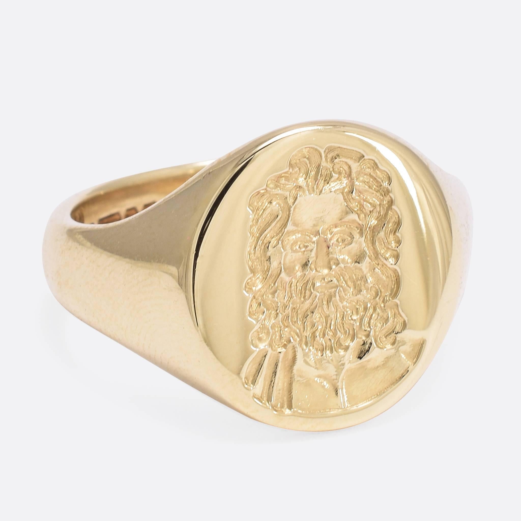 This wonderful oversized signet ring features an intaglio carving of Zeus, King of the Gods in Ancient Greek Mythology. The hand-carved portrait is of impeccable quality. Modelled in 9ct gold, the ring bears hallmarks for the year 1955 and the