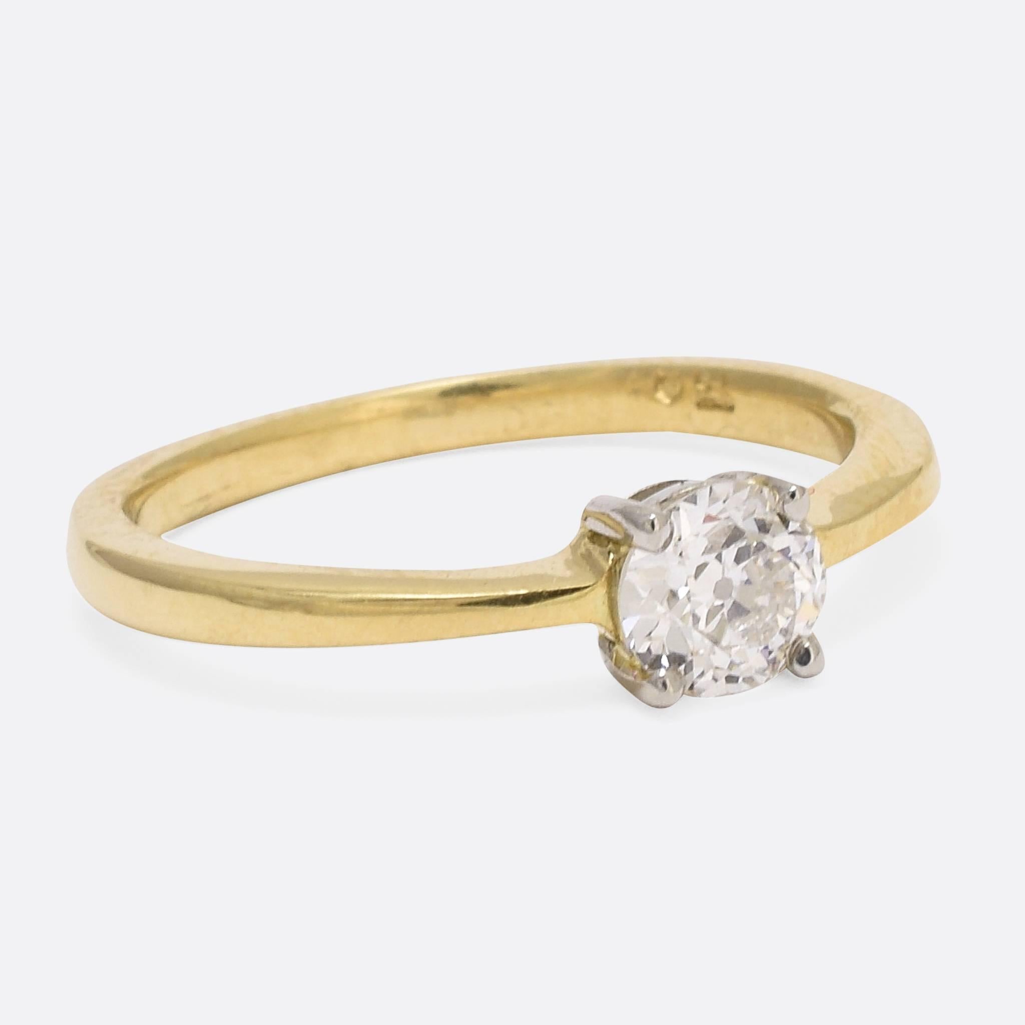 We have set this stunning antique .47ct diamond in a contemporary four-claw ring mount. The circular brilliant cut stone was cut in the early 20th Century, c.1910, and is GIA certified as VS1 Clarity and F Colour. The Circular Brilliant Cut was