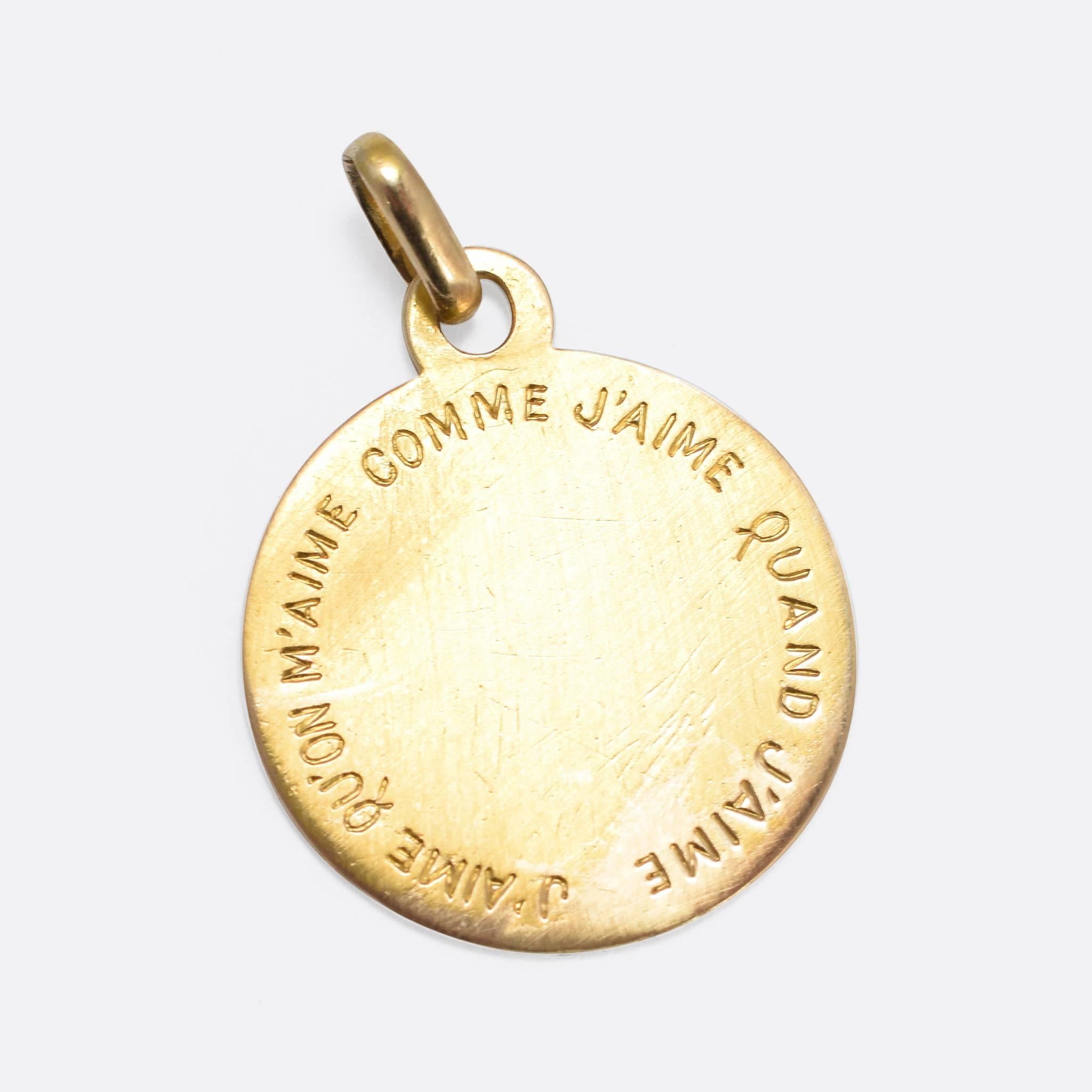 This sweet antique love token pendant is modelled in 18k yellow gold, with the romantic text: 