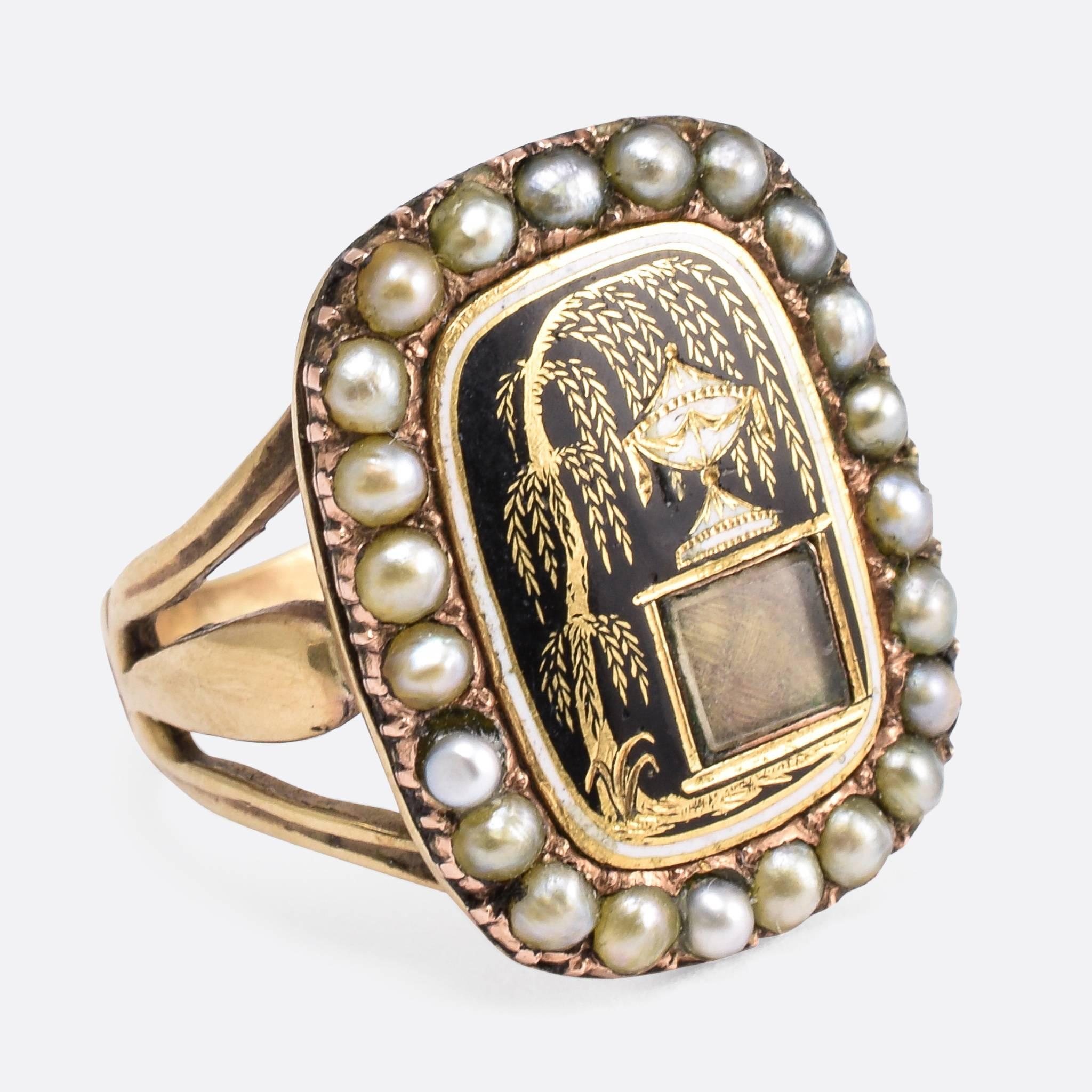 This exquisite antique mourning ring depicts a weeping willow behind an urn - the latter sat atop a plinth containing a small woven lock of hair. The detail is worked in gold, with fine black enamelling to the background, and white enamel on the