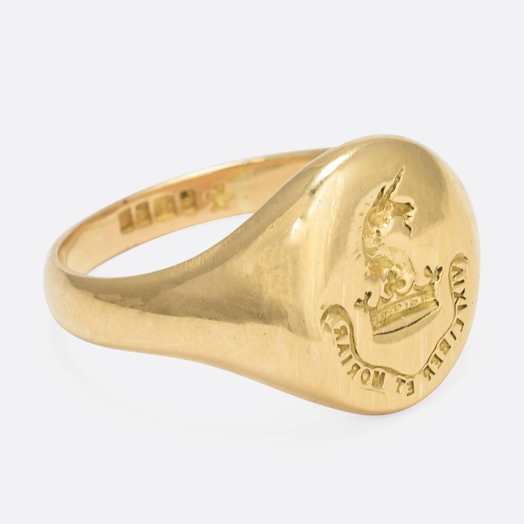 This cool Edwardian signet ring features an intaglio crest of a unicorn on a crown. Beneath is the Latin motto: VIXI LIBER ET MORIAR, or 