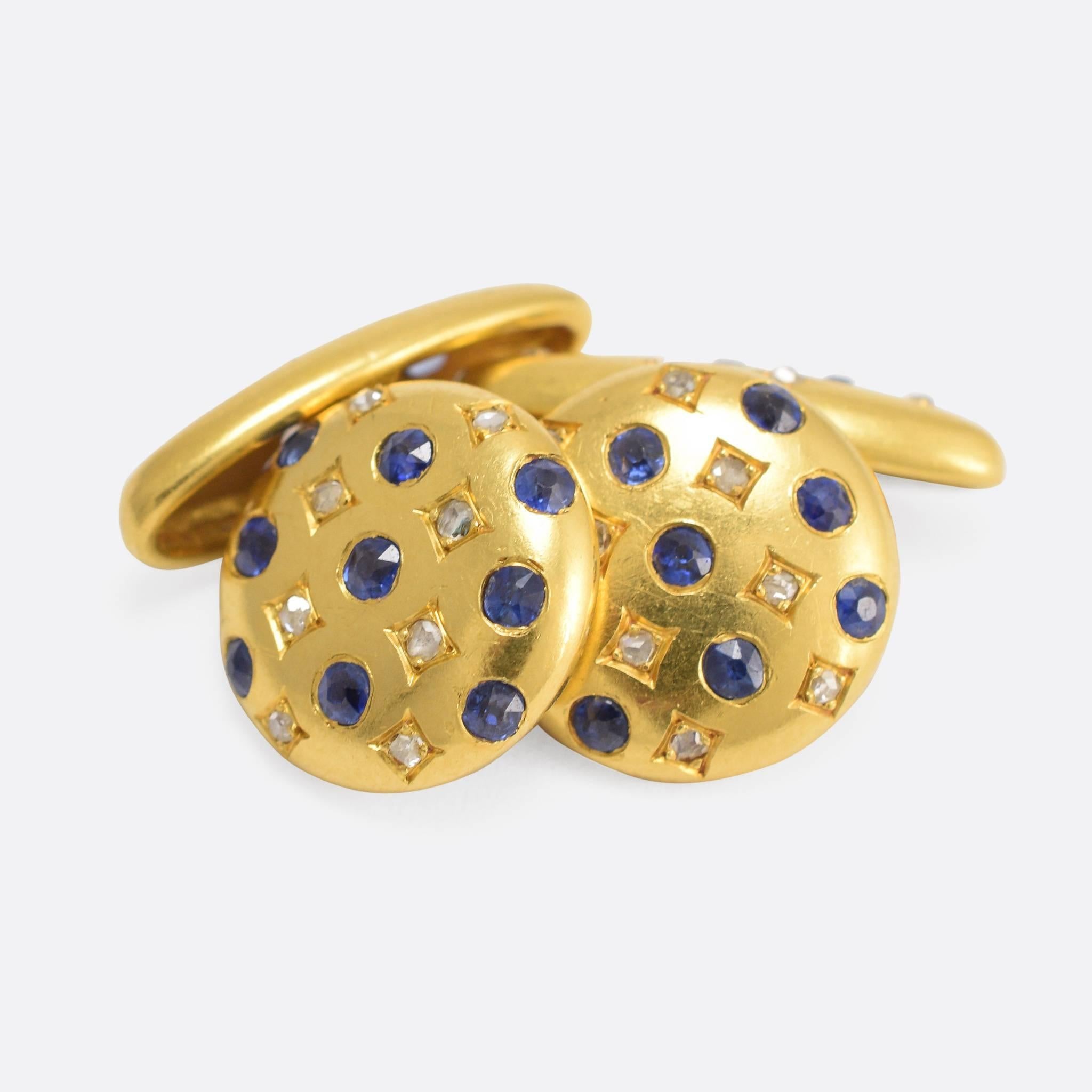These fine gents' cufflinks are modelled in 18k gold, and set with vibrant blue sapphires and rose cut diamonds. With a refined elegance, they are certainly not too showy whilst clearly of exceptional quality. Circles: 13.9mm diameter - Ovals: 19.2
