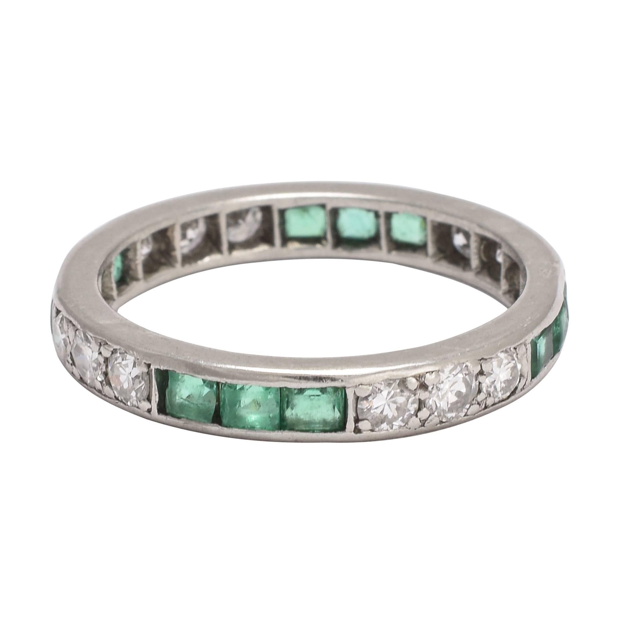 1920s Art Deco Emerald Diamond Platinum Eternity Ring For Sale