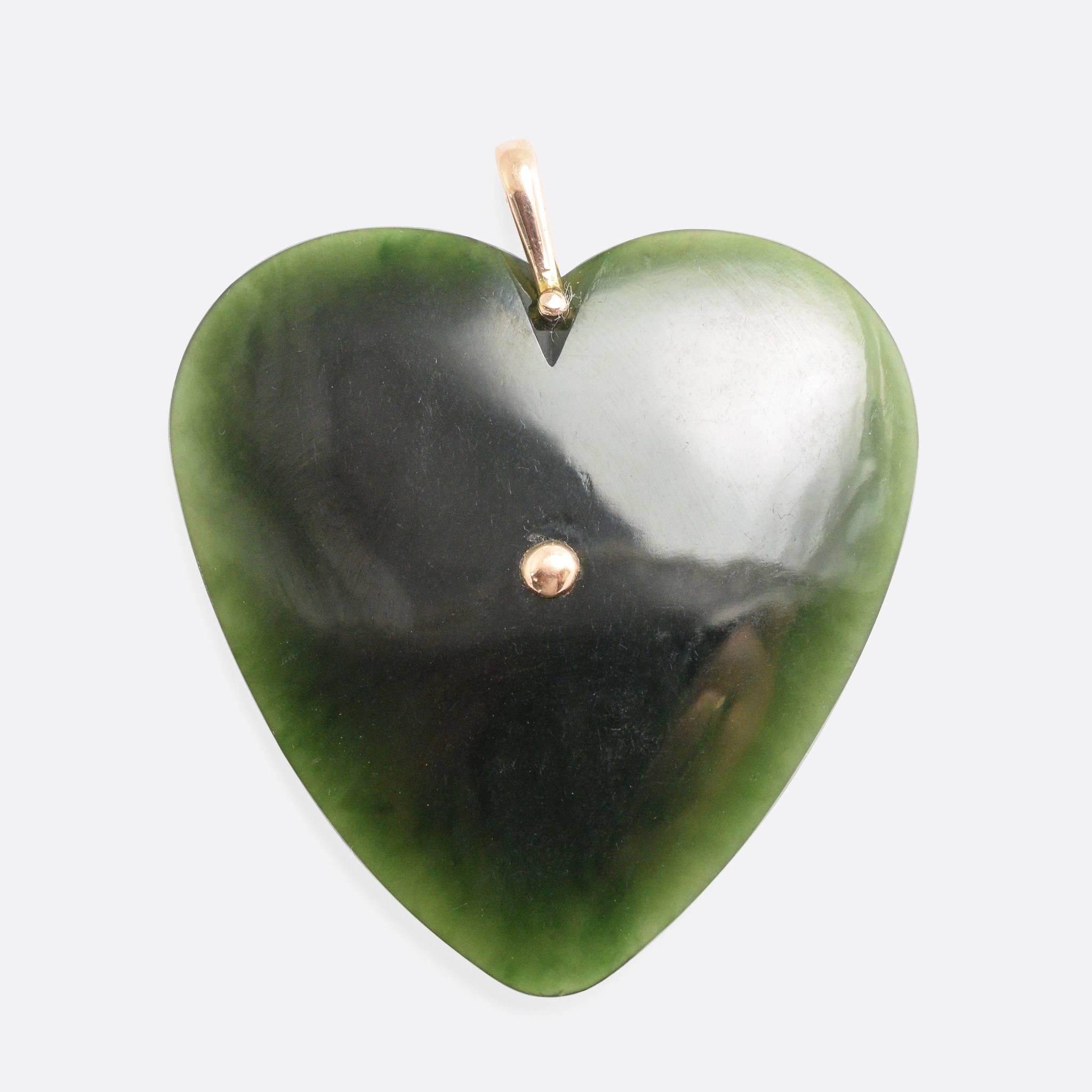 This cool oversized pendant is made from New Zealand greenstone (or nephrite). The stone has been carved into a heart shape, with an applied silver fern centrepiece (actually modelled in 9k gold). The silver fern (Cyathea dealbata) motif is