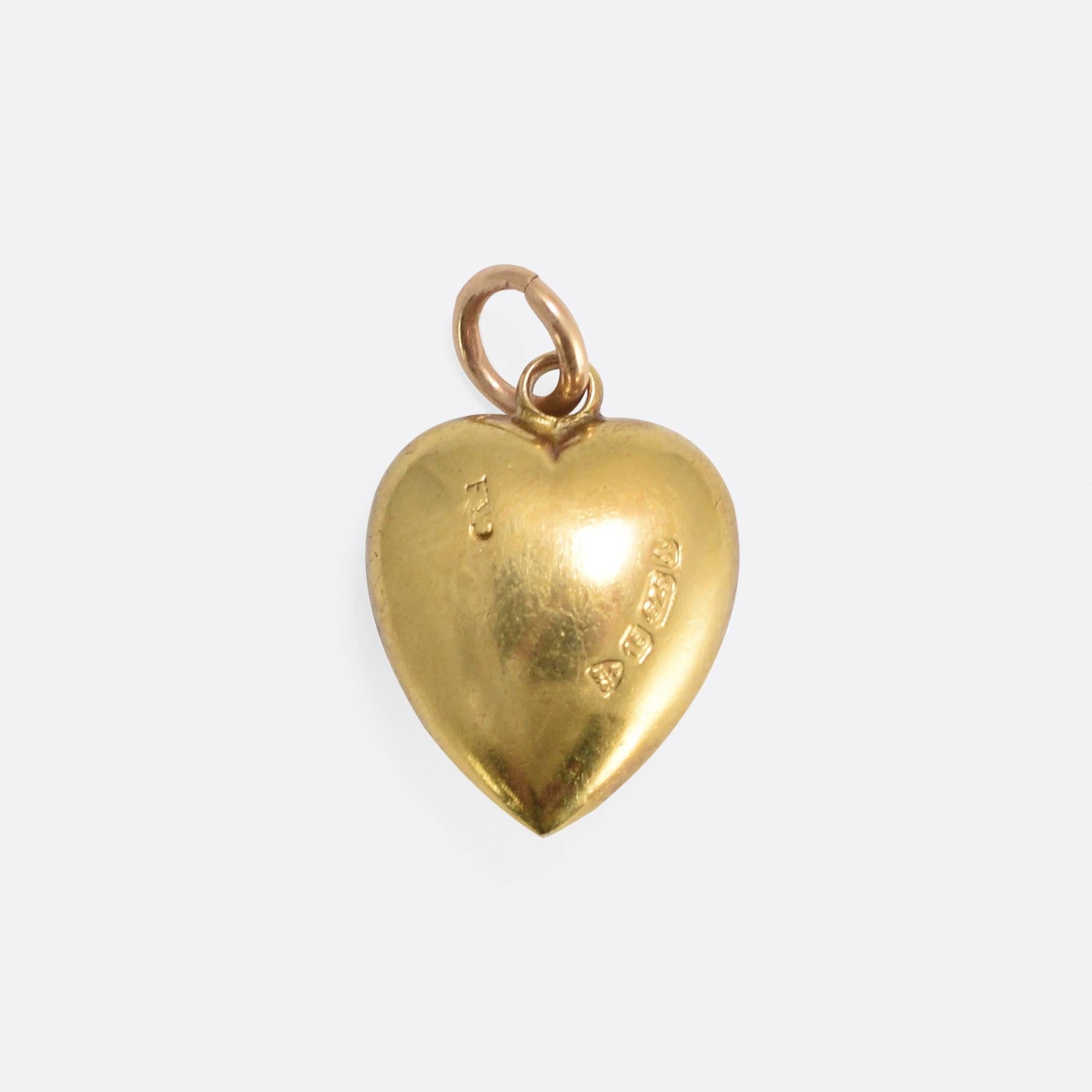 This sentimental puffed heart pendant was made right at the end of the Victorian Era. Modelled in 15k gold, it’s set with a turquoise cabochon and rose cut diamonds – all in a central star motif. The piece bears clear English hallmarks for the year