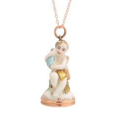 18th Century Derby Chelsea Cupid Holding a Bottle Porcelain Fob Seal Pendant