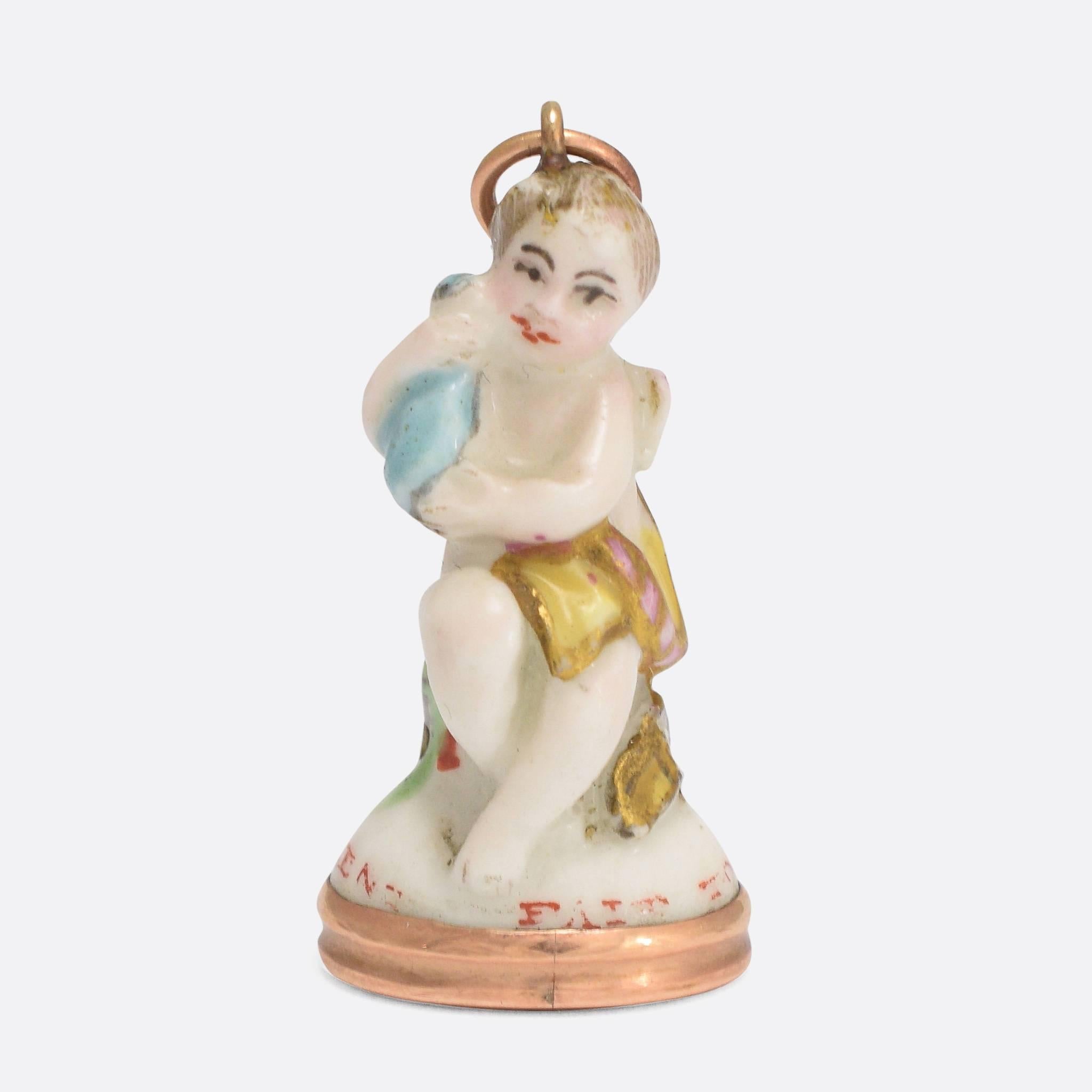 18th Century Derby Chelsea Cupid Holding a Bottle Porcelain Fob Seal Pendant In Excellent Condition In Sale, Cheshire