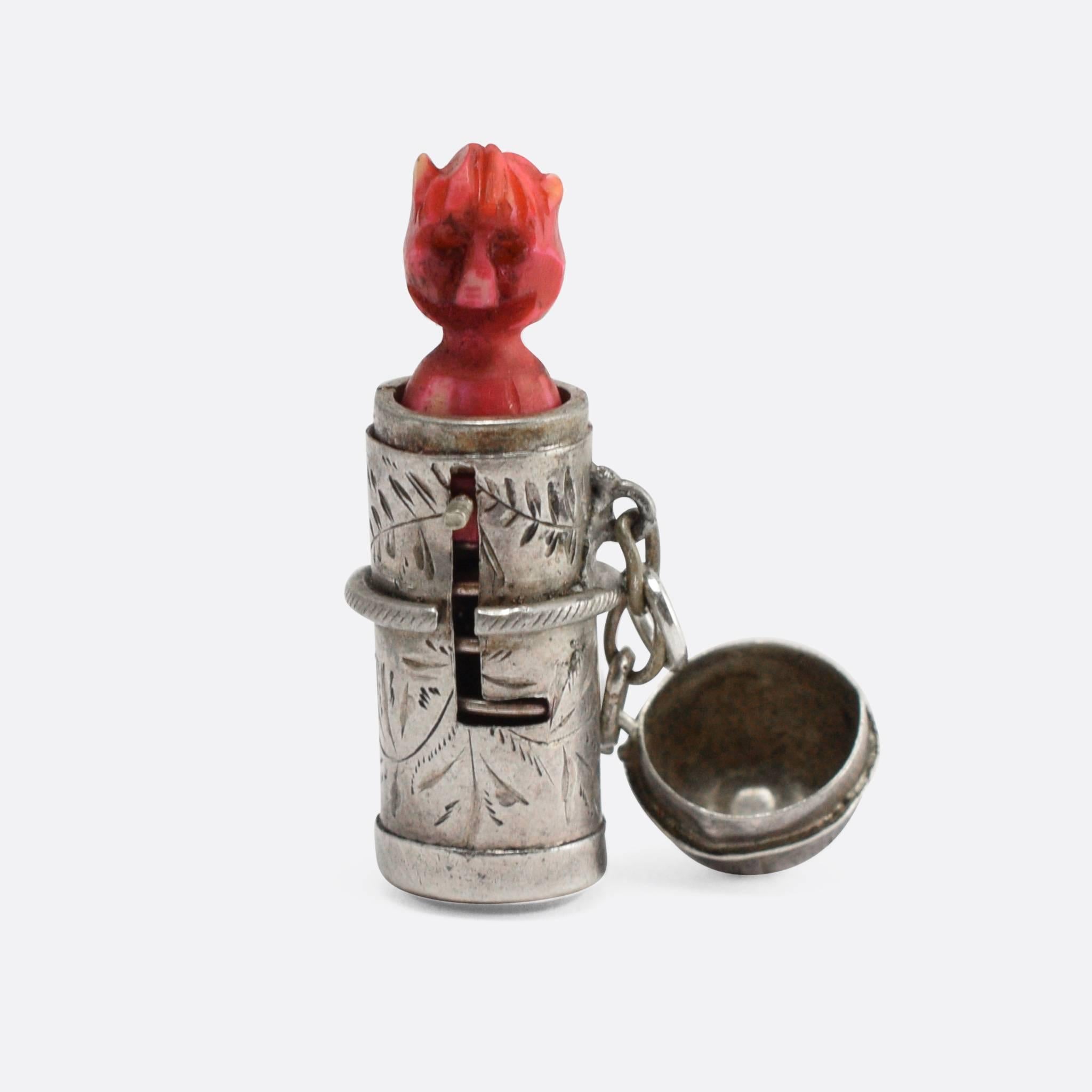 This cool antique charm pendant is modelled in sterling silver, attractively embellished with hand-chased detailing all around. On cue, the spring-loaded red devil creature pops out of the box - throwing the lid off the top.  A charming novelty