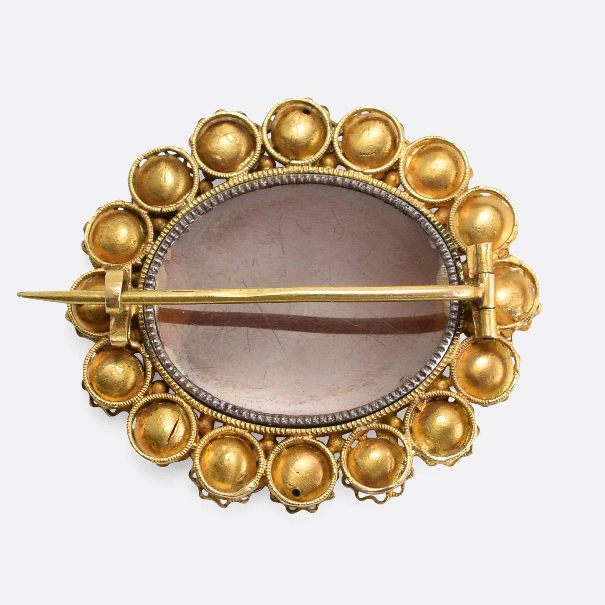 This brooch blew me away when I first saw it... There's just so much about it... The harlequin gemstones, the regency period filigree goldwork, the cameo - of course!