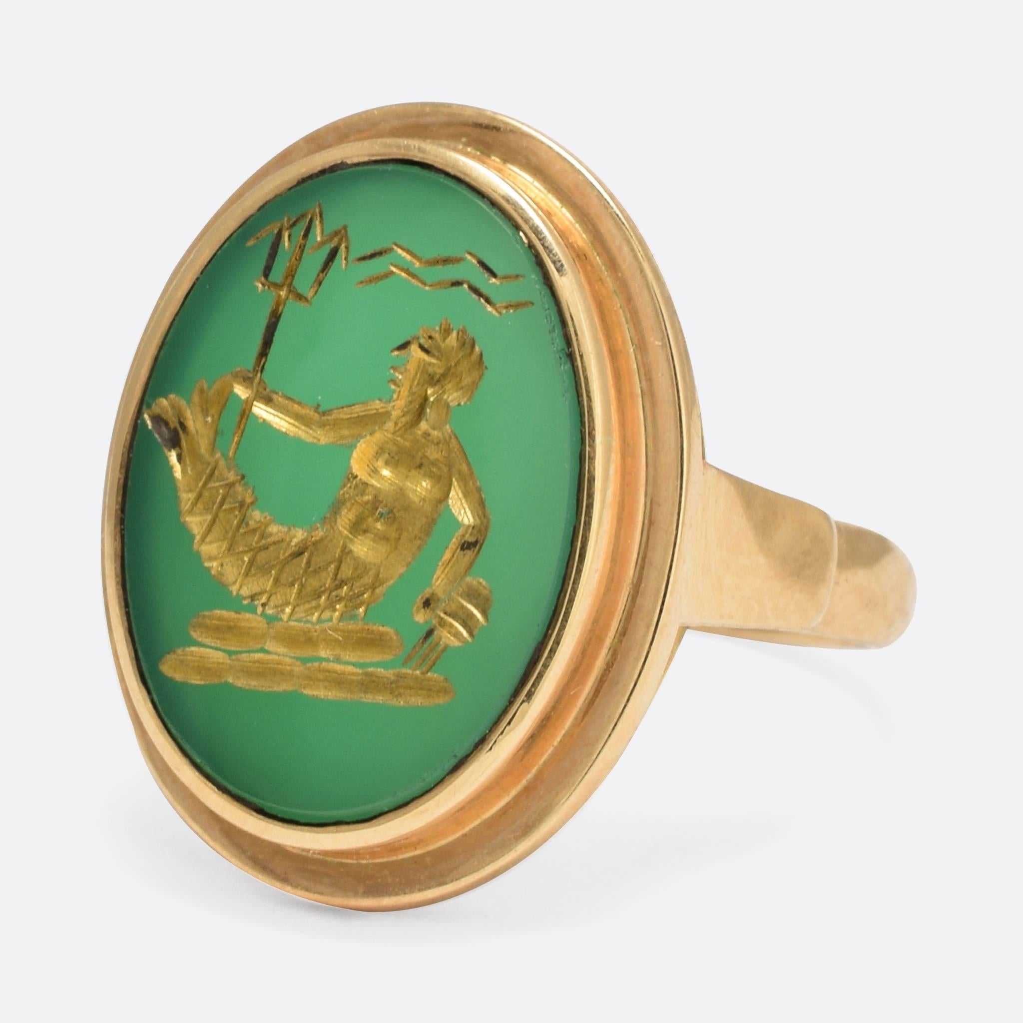 This cool intaglio ring depicts the ancient deity Poseidon (or Neptune if you're Roman). He has been modelled in the ancient style, with trident in hand, although this ring is no where near that old and, somewhat unusually, the intaglio has been