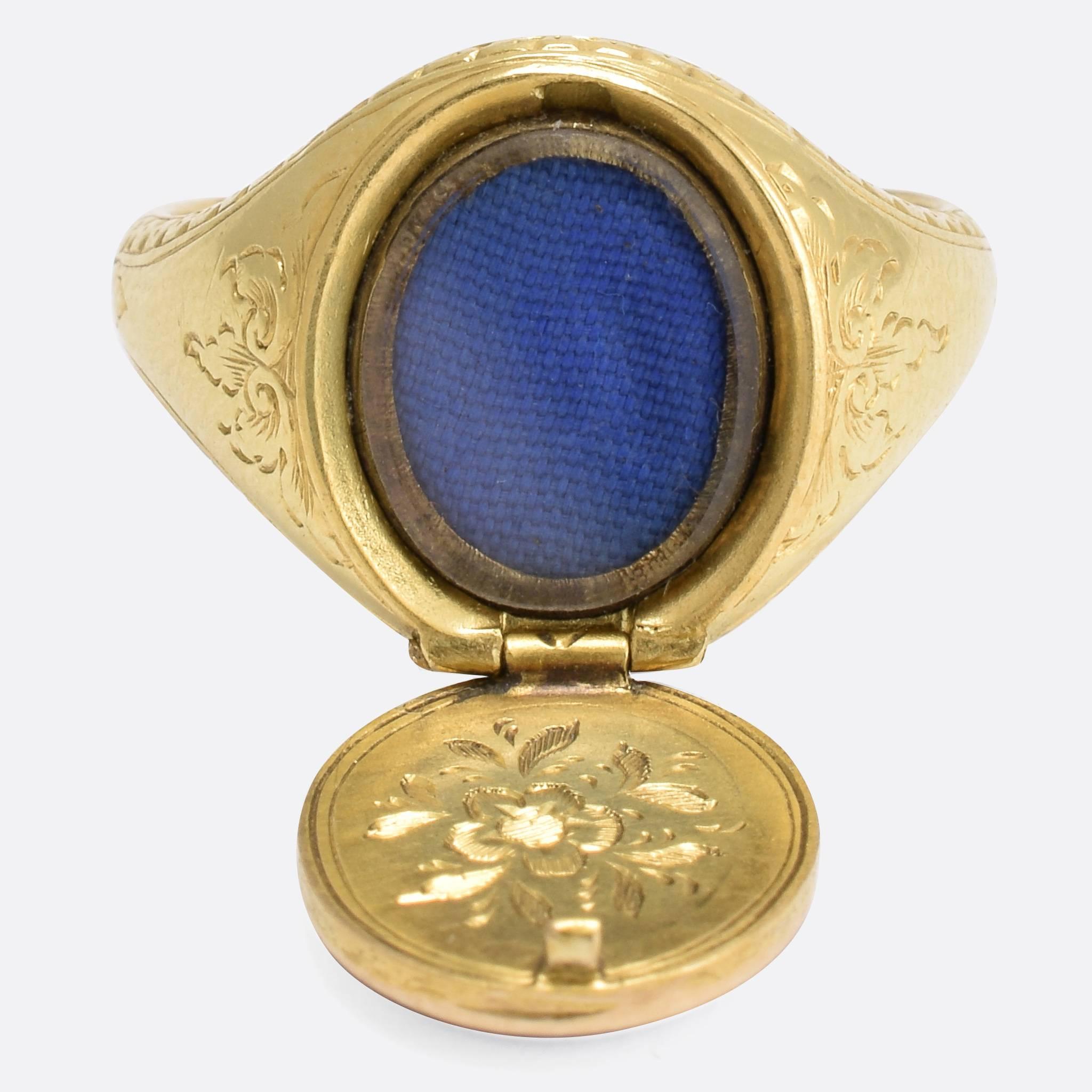 This incredible signet ring would be beautiful enough, even if it wasn't for the hidden locket compartment... The Sardonyx panel is hinged, and opens up to reveal a glass-fronted locket compartment, with wonderful chased detail inside the lid. The
