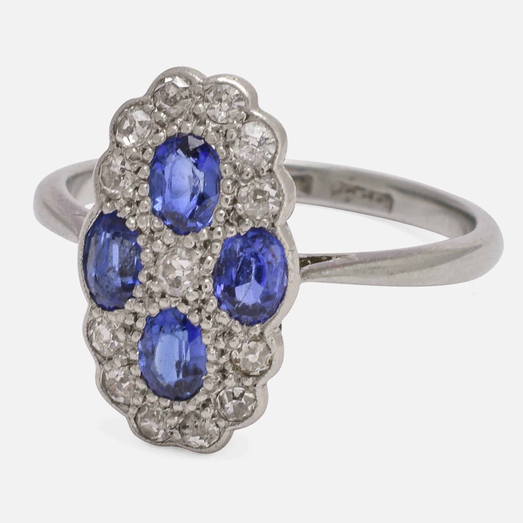 This cool Art Deco cluster ring is set with natural blue sapphires and old cut diamonds. For some reason it has a kind of other-worldly feel, but I can't quite figure out why... It's modelled in 18k white gold with platinum settings, and dates to