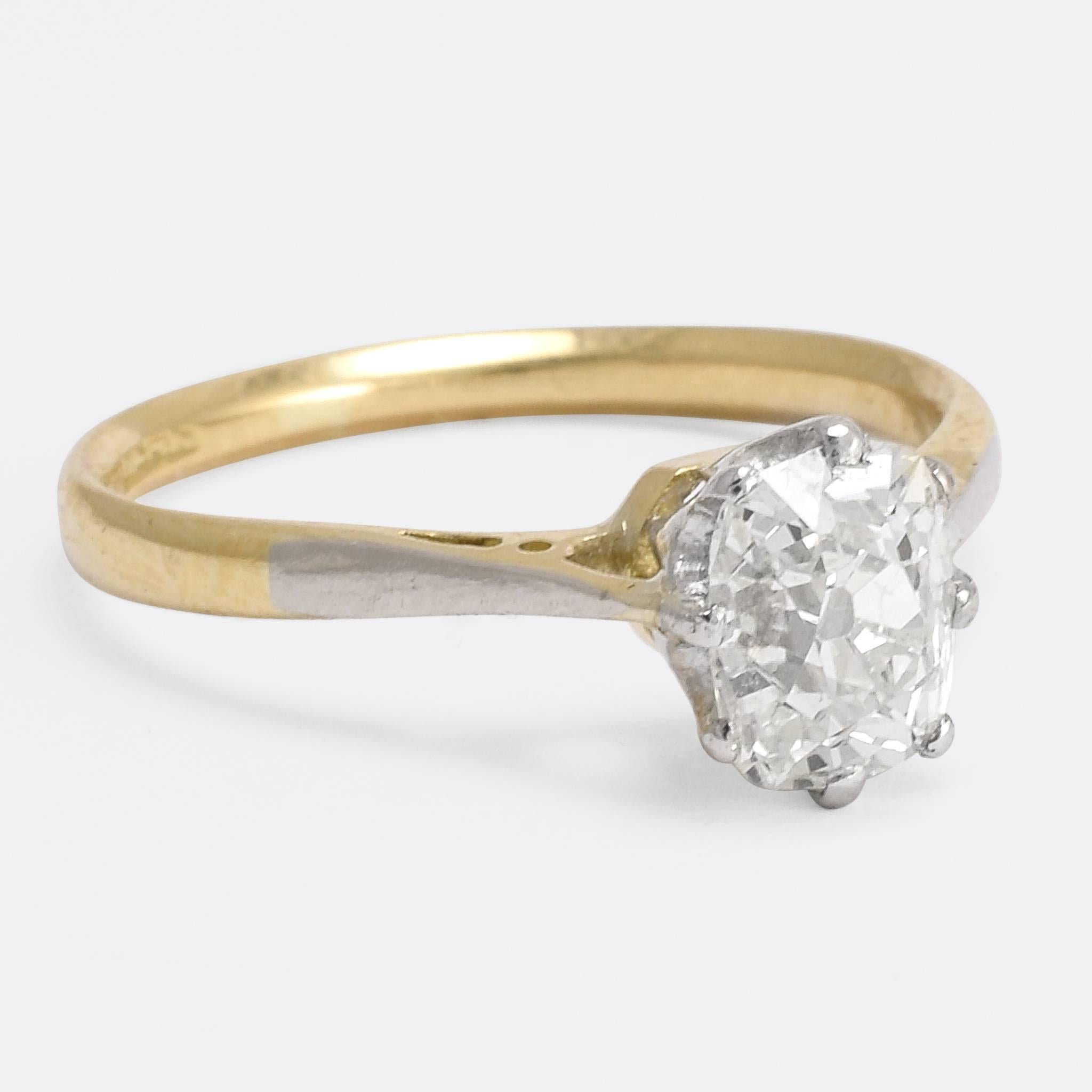 An exceptional antique diamond solitaire engagement ring, set with a 1.5ct OMC diamond. The old mine cut - known as old miners - was developed in the 18th Century, cut by hand into a rounded square (or in this case rectangle) they feature a high