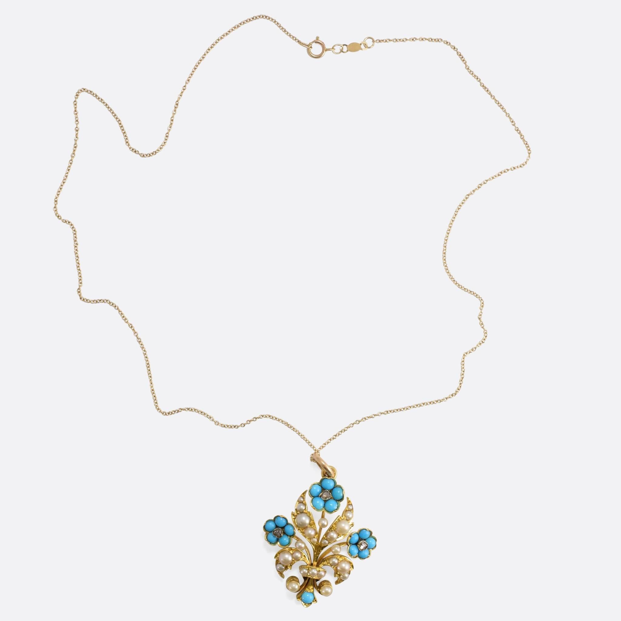 A brightly coloured 15k gold flower pendant, beautifully set with Natural split pearls, Persian turquoise cabochons and rose cut diamonds. A particularly good quality example, with pendant fittings for wear on a light chain / necklace. 
