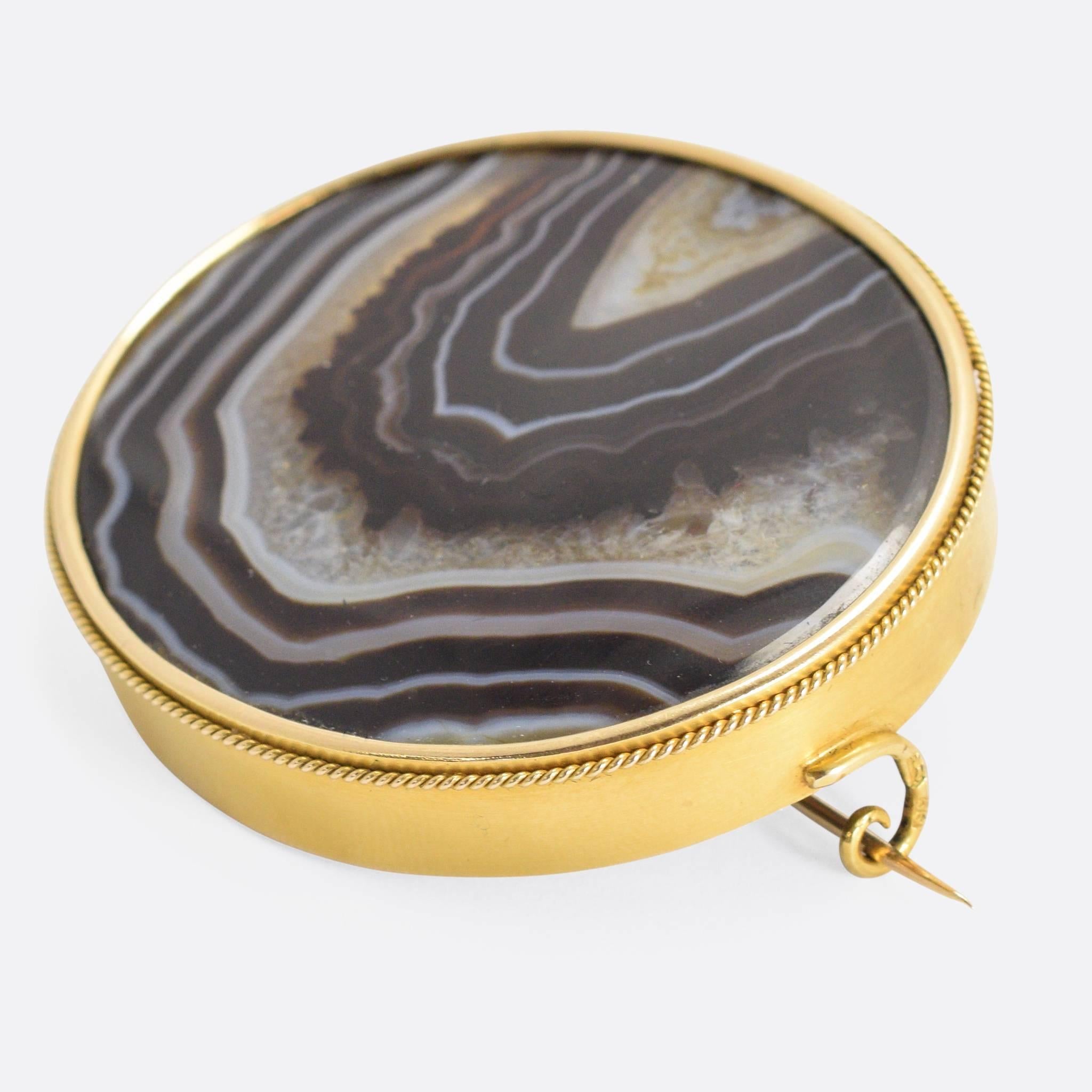 An incredibly high quality Russian brooch set with the largest single piece of banded agate I have ever seen in a piece of jewellery. The gold mount is a beautiful 56 zolotnik (14 karat) yellow gold with a rope work style surround. Offered in its