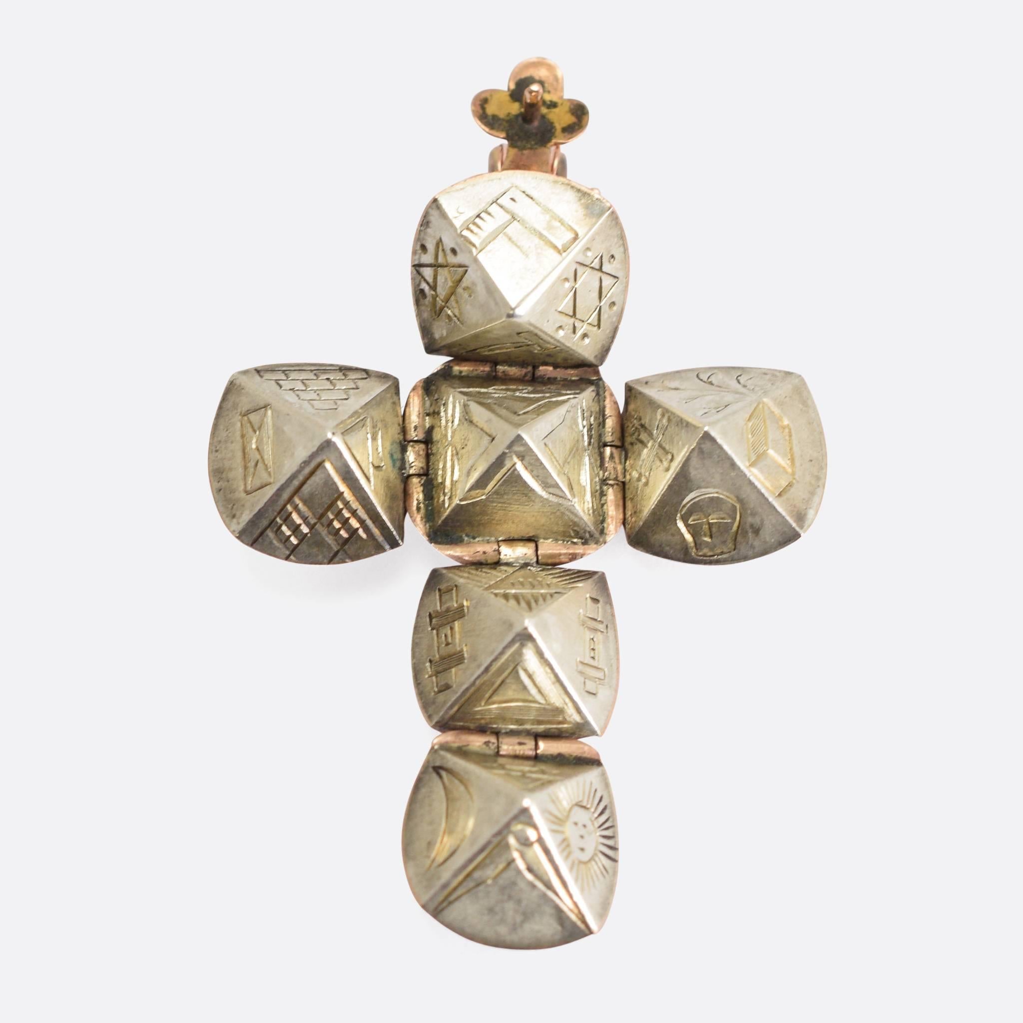A splendid antique Masonic Orb pendant, modelled in 9k rose gold with silver innards. It dates to the late 19th Century, c.1880 - a clue to its age being that the closing arms are individually hinged... more recent examples feature a rigid 