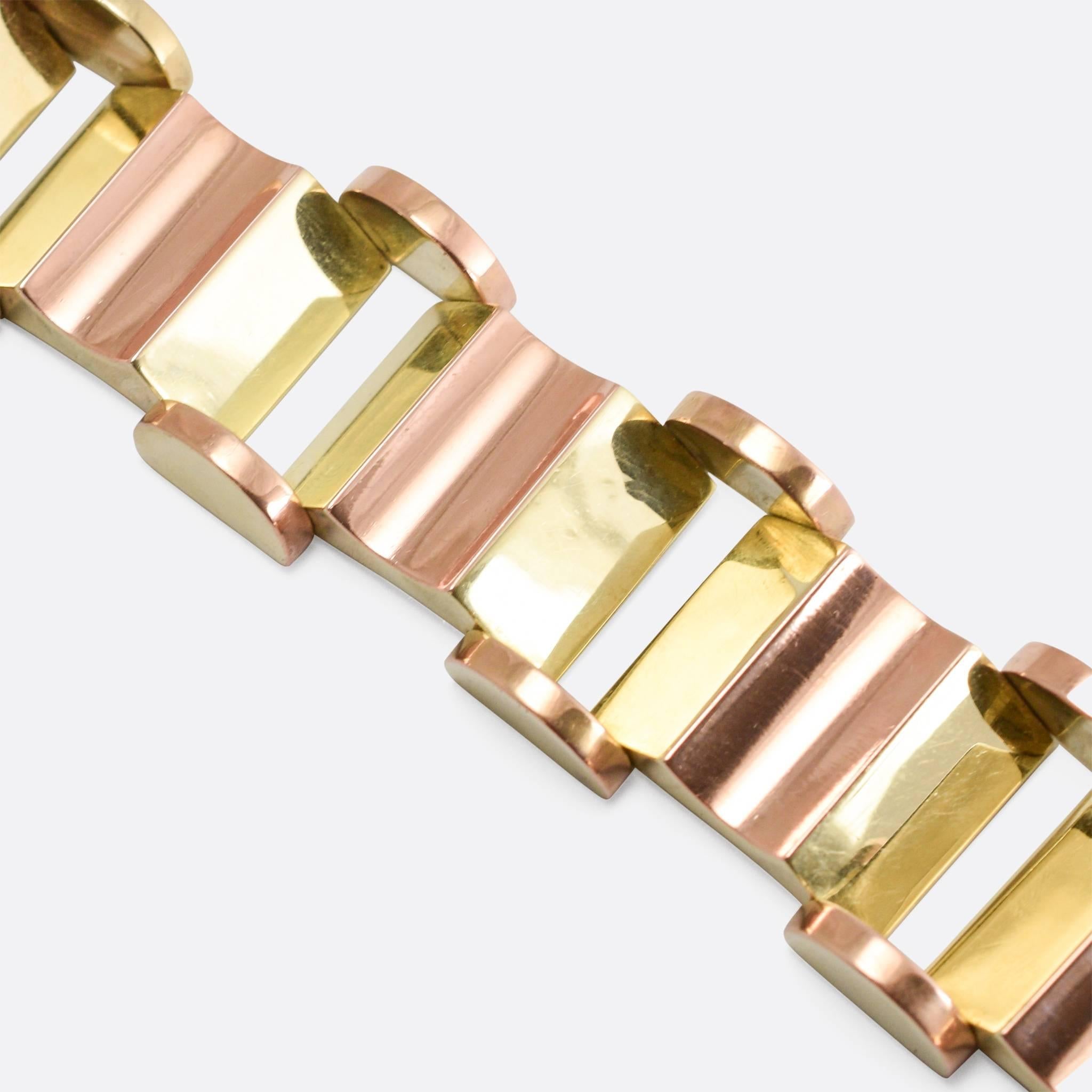 A cool 1940s chunky gold bracelet, with half moon and concave truncated pyramid motifs. Modelled in two-tone rose and yellow gold, the piece features the big and bold design associated with the Mid-Century / Retro style that developed in the fourth