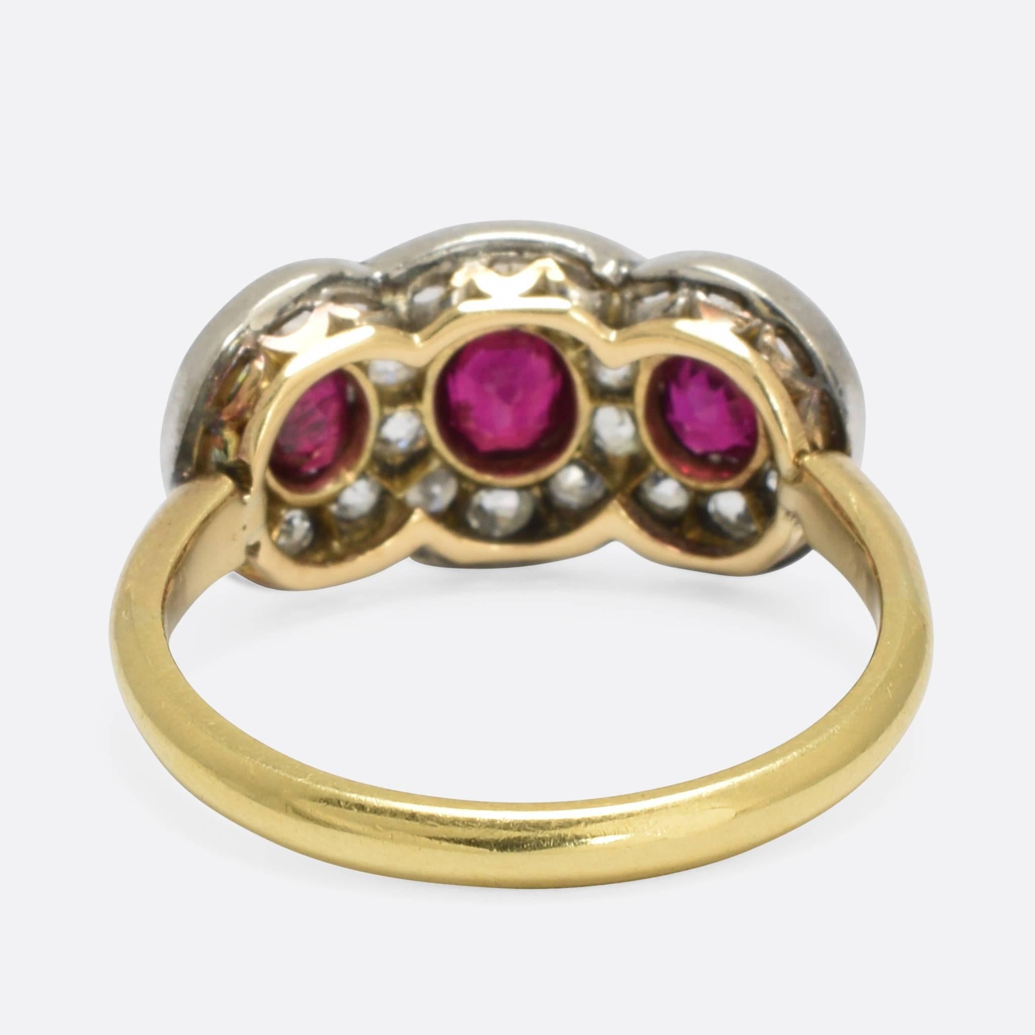 Edwardian Ruby and Diamond Three-Stone Halo Ring In Excellent Condition In Sale, Cheshire