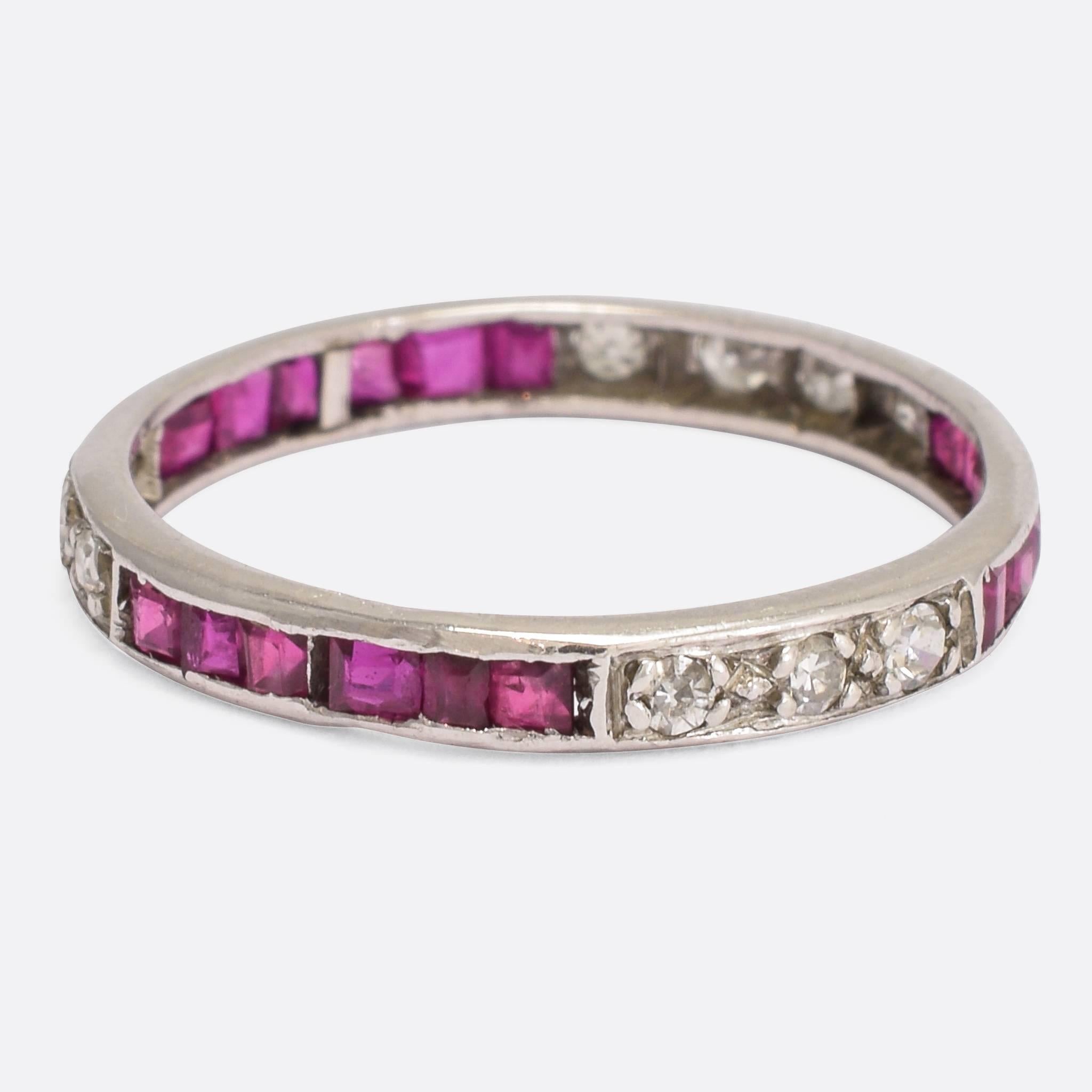 An elegant Art Deco period Eternity ring, channel set with alternation sections of rubies and diamonds. It's modelled in platinum throughout, and a good size 6.5 US.

STONES
Natural Rubies and Diamonds

RING SIZE
6.5 US

MEASUREMENTS
Width of band: