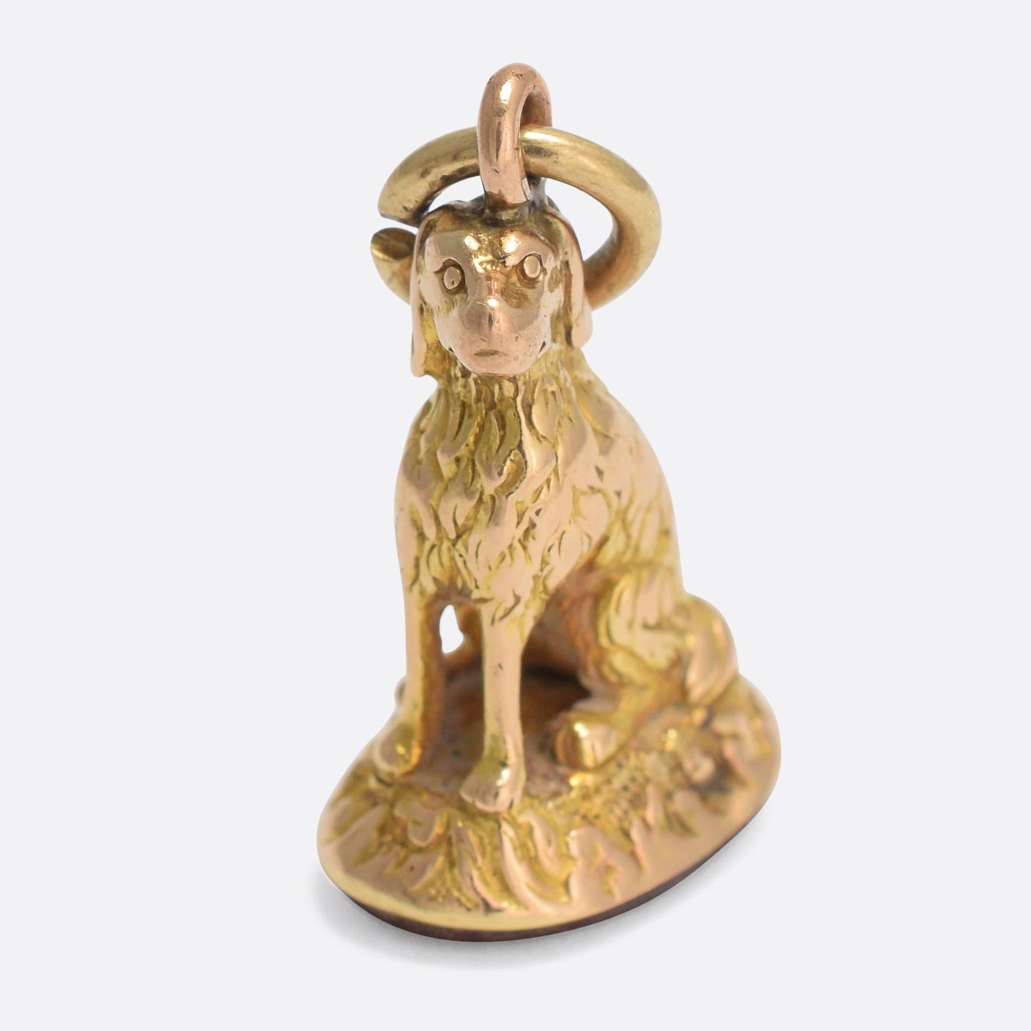 A charming antique seal fob set with an uncarved carnelian panel. The fob itself is modelled in 15k gold, and has been made in the form of a dog - with exceptional hand-chased fur detailing. A wonderful late Georgian piece, ideal for wear on a fine
