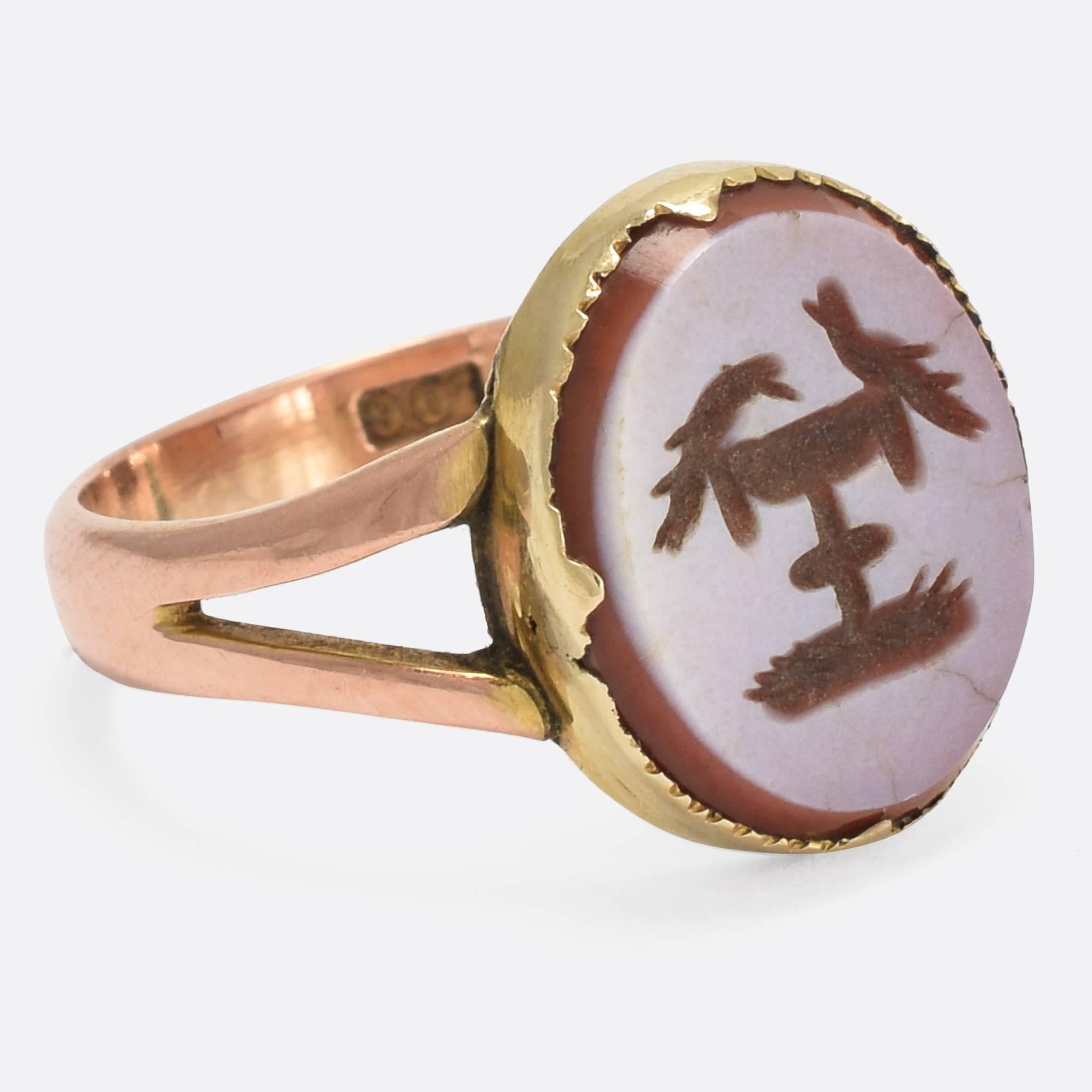A wonderful early Victorian Signet Ring with sardonyx intaglio depicting the 