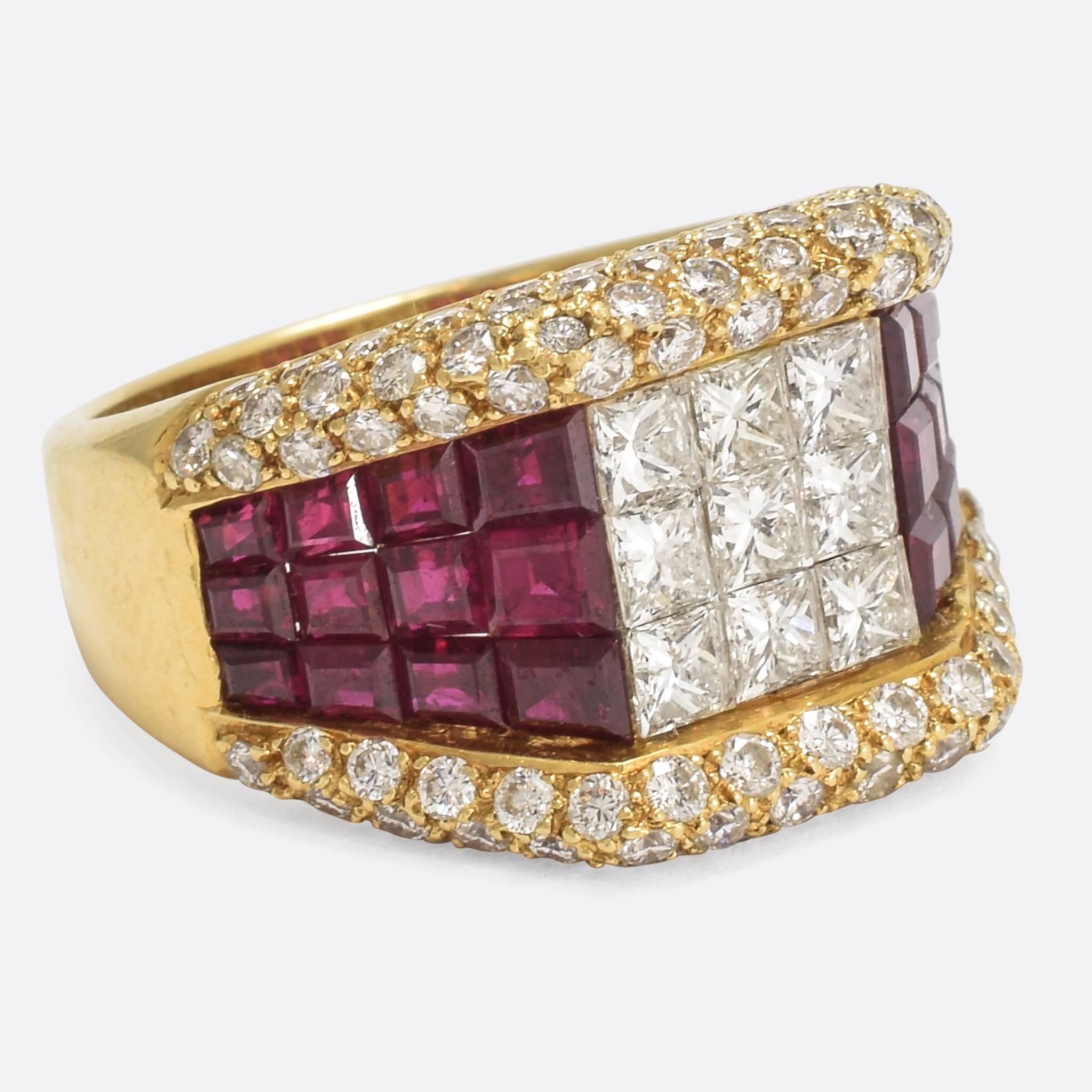 This modern ruby and diamond ring dates to the 1990s... and I can totally imagine Tupac or Diddy rocking it as an ultra-bling pinky ring. It's studded with 4.30cts of calibré cut rubies, a 1.0ct square of princess cut diamonds, and 1.30cts of