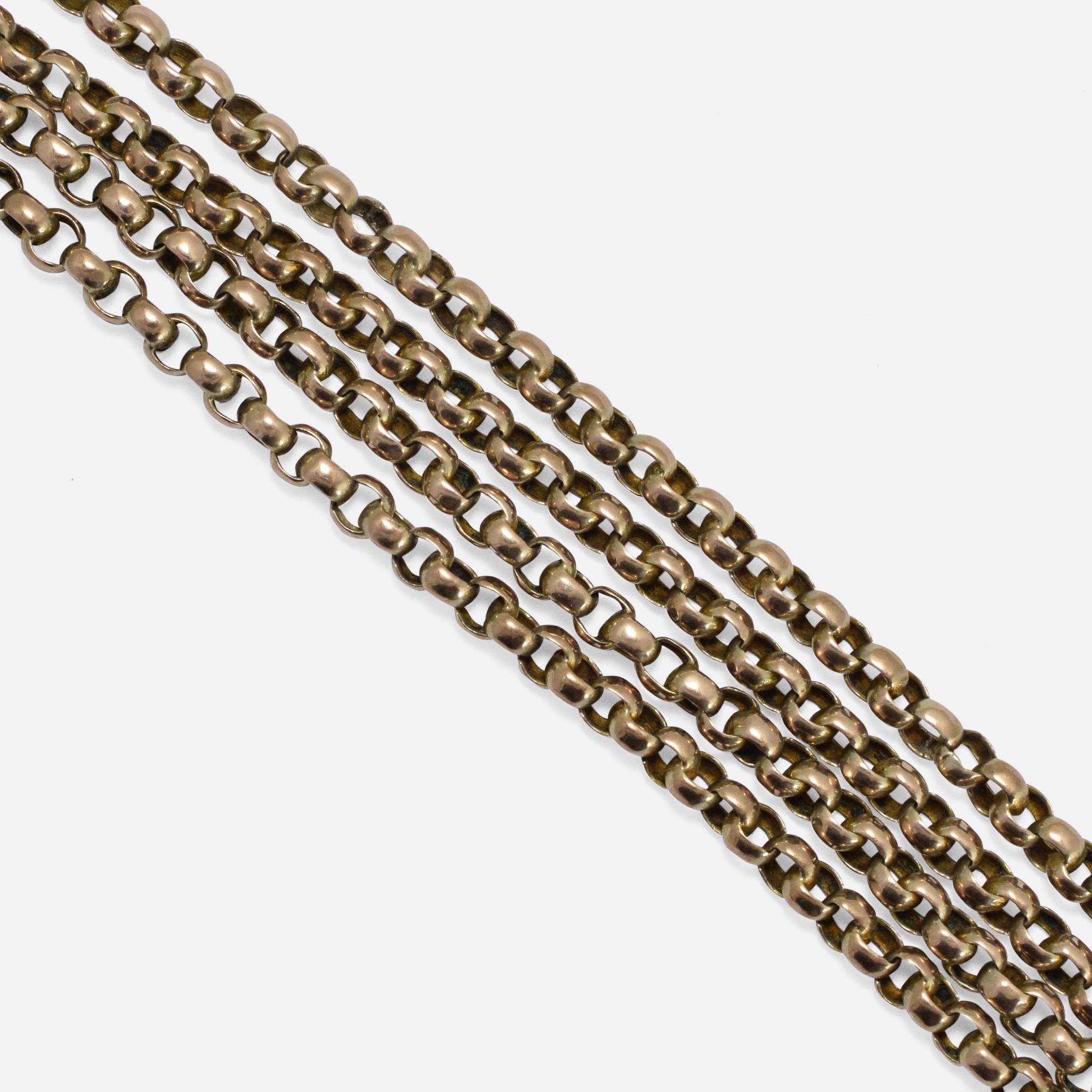 A classic Victorian 9 karat gold guard chain, 48 inches in length with belcher links and a dog tag fastener. Guard chains are long chains that were traditionally used to hold a watch - or sometimes a fur muff, used to keep the hands warm - and were