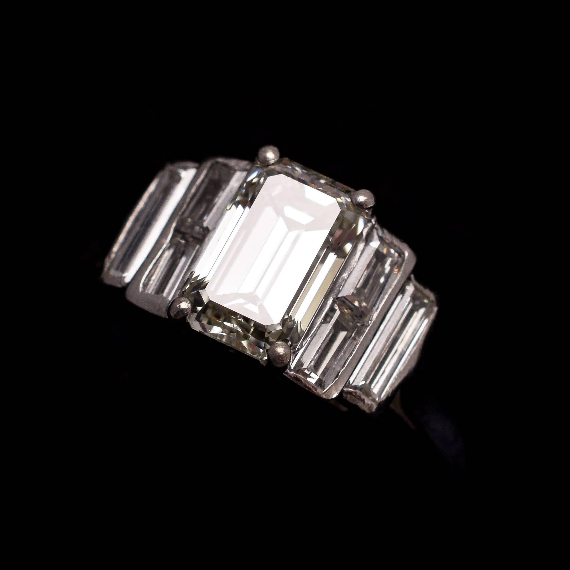 Art Deco 1.35 Carat Emerald Cut Diamond Engagement Ring In Excellent Condition For Sale In Sale, Cheshire