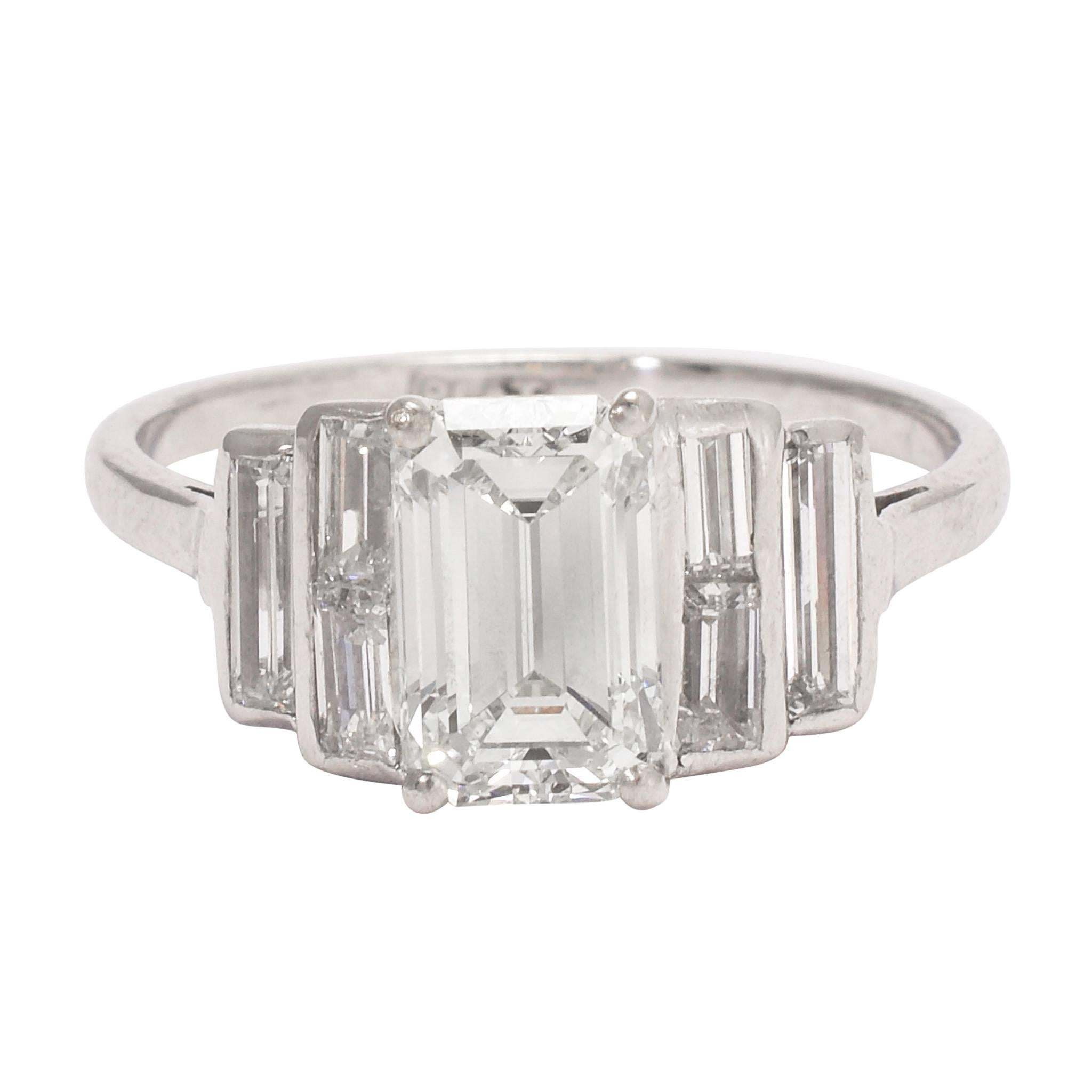 Art Deco 1.35 Carat Emerald Cut Diamond Engagement Ring For Sale