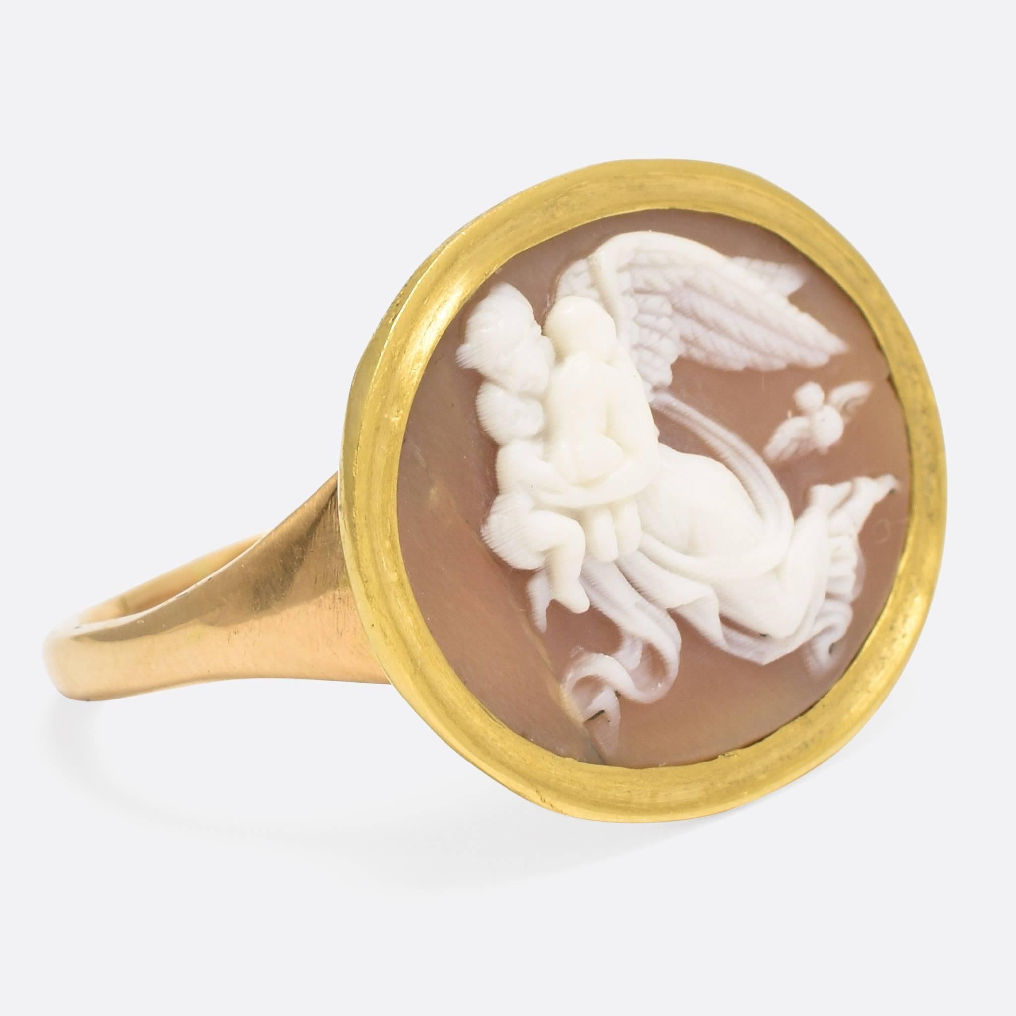 An incredible late Georgian Cameo Ring, set with a hand carved depiction of "Night" by Bertel Thorvaldsen. The original marble relief hangs in the Thorvaldsen Museum in Copenhagen, opposite it's counterpart "Day". This ring dates