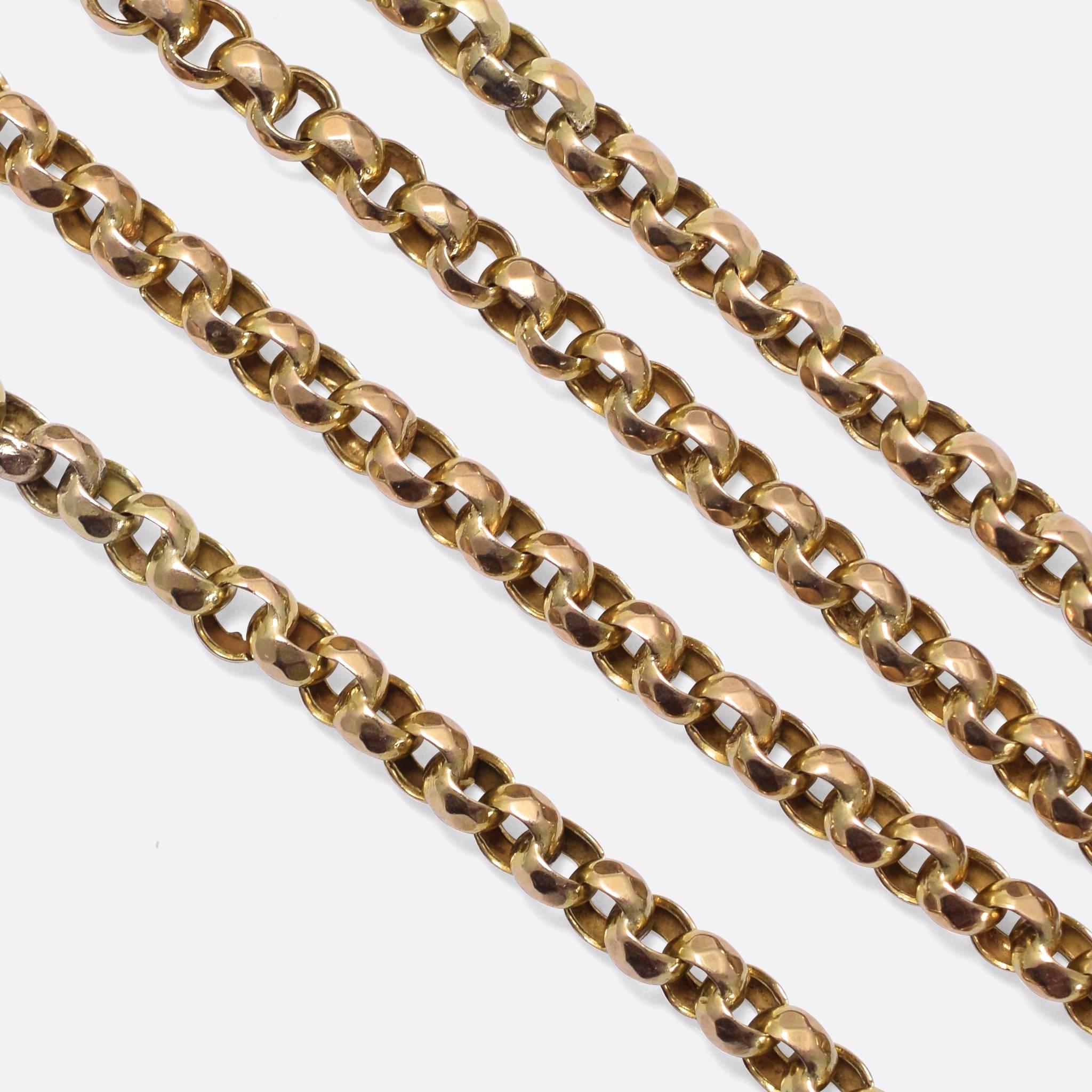 A classic antique half guard chain, modelled in 9k yellow gold with faceted belcher links. The piece is in excellent condition and measures 32 inches in length; it closes securely with a swivel clasp.

MEASUREMENTS
Length: 32 inches - Individual