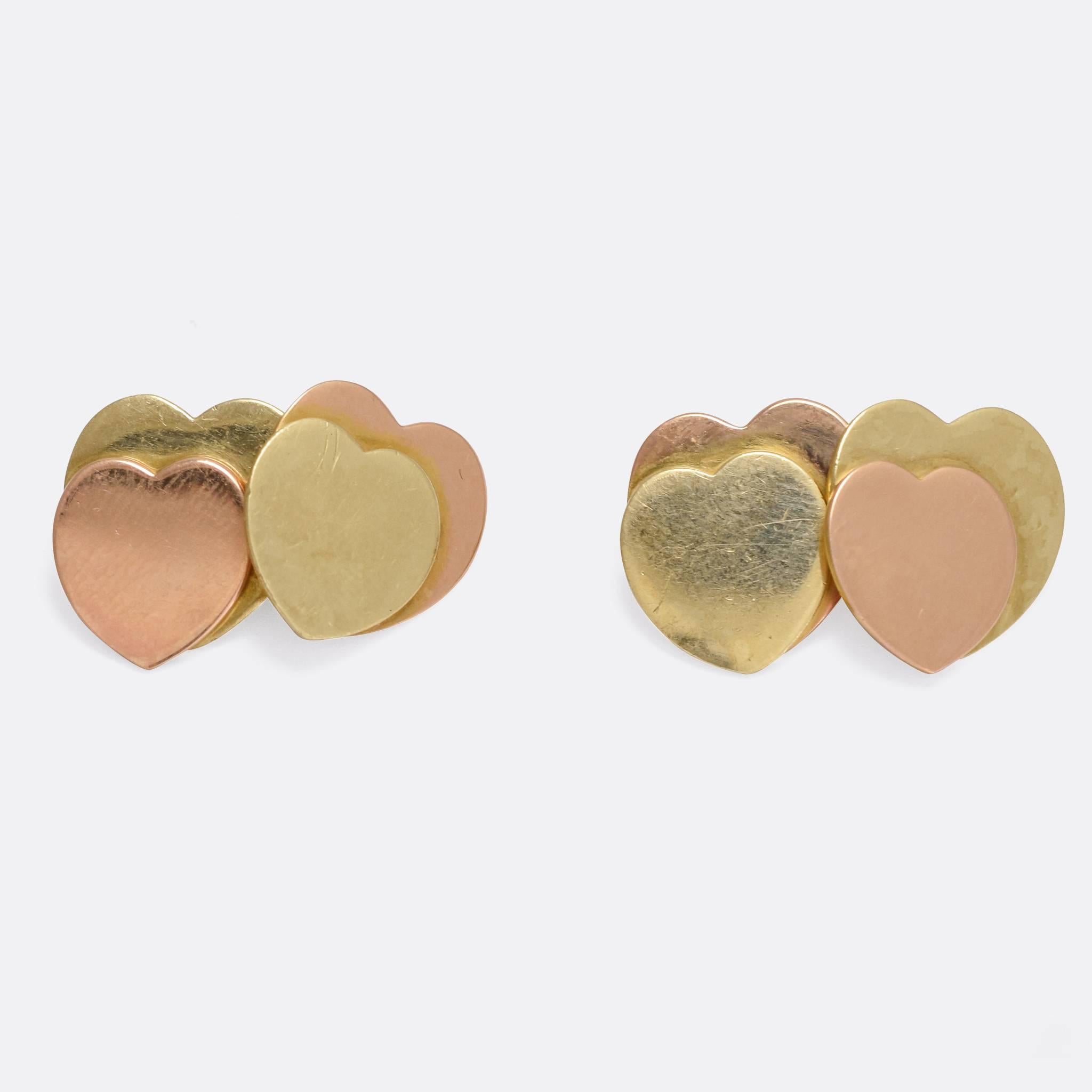 A particularly lovely pair of vintage double-panel cufflinks, with each panel modelled as two hearts - one in rose gold, the other in yellow gold. They would make a sweet and romantic gift; they're high quality and crafted from 18 karat gold