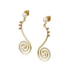 Pendientes «Swirl» de oro amarillo de 18 quilates con diamantes, rubíes y perlas
