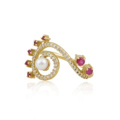 Anello Swirl in oro giallo 18 carati con diamanti, rubini e perle