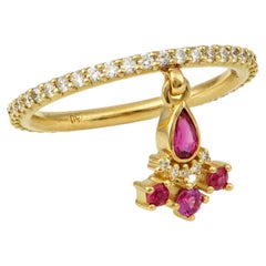 Eternity Ring With Ruby & Diamond Dangling Motif in 18 Karat Yellow Gold