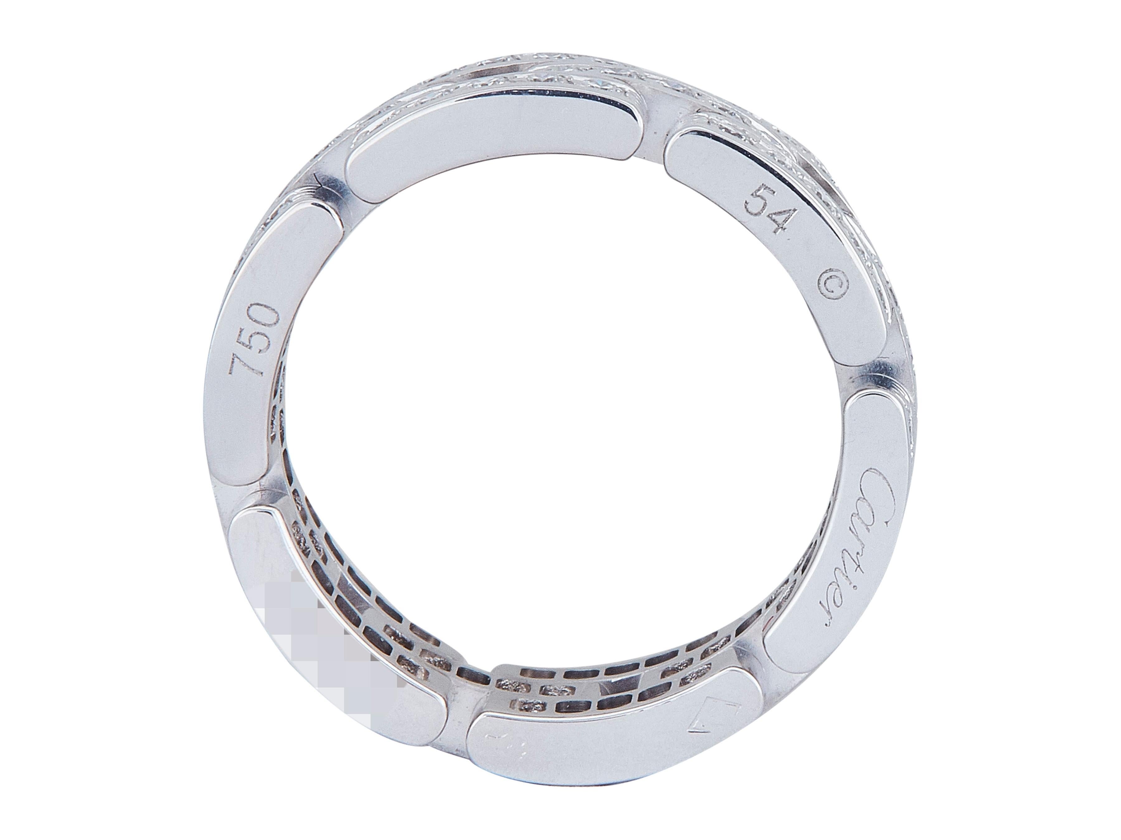 La bague : Une bague Cartier Maillon Panthère en or blanc dix-huit carats. Conçue comme trois rangées de diamants ronds de taille brillante. Les bagues sont de taille 54.

Accompagné de ...
Boîte d'origine
Certificat d'authenticité
Papier de