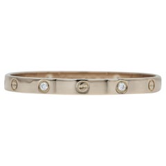 Bracelet Cartier Love, modèle classique, 4 diamants, or rose 18 carats, taille 17
