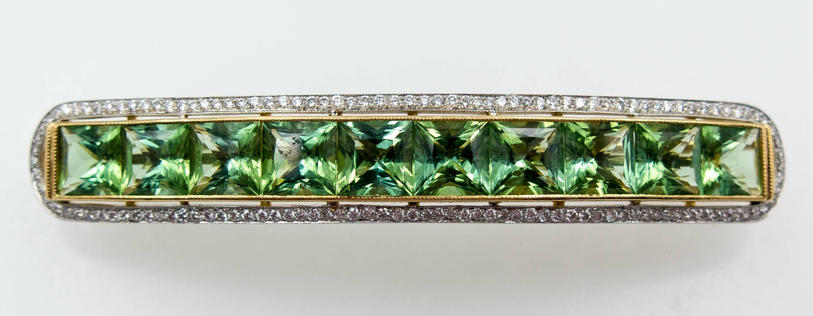 A totally unnecessary hair ornament, and perhaps for that reason, something desirable.  We assume this was custom made to the original owner's specifications because the workmanship is so beautiful and the mint green tourmalines so well matched. 