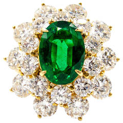 Elegant and Important Emerald Diamond Gold Cluster Ring