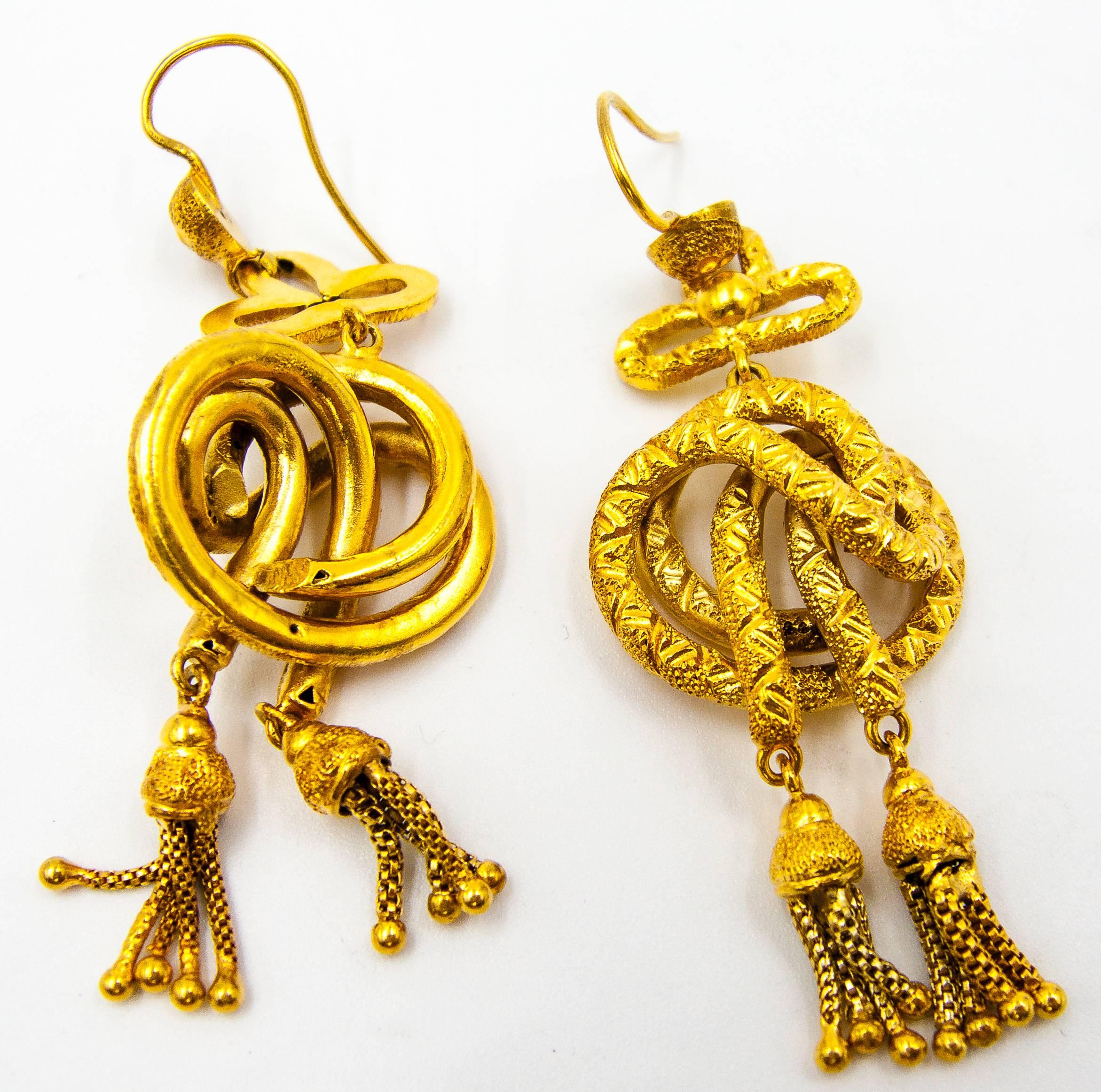    Unique and feminine, these elegant Victorian earrings are perfect for day or evening wear.   They're 2 1/2 inches in length, and the bottom tassels move gently as you wear them.  Definitely for the confident collector of Victorian earrings and a