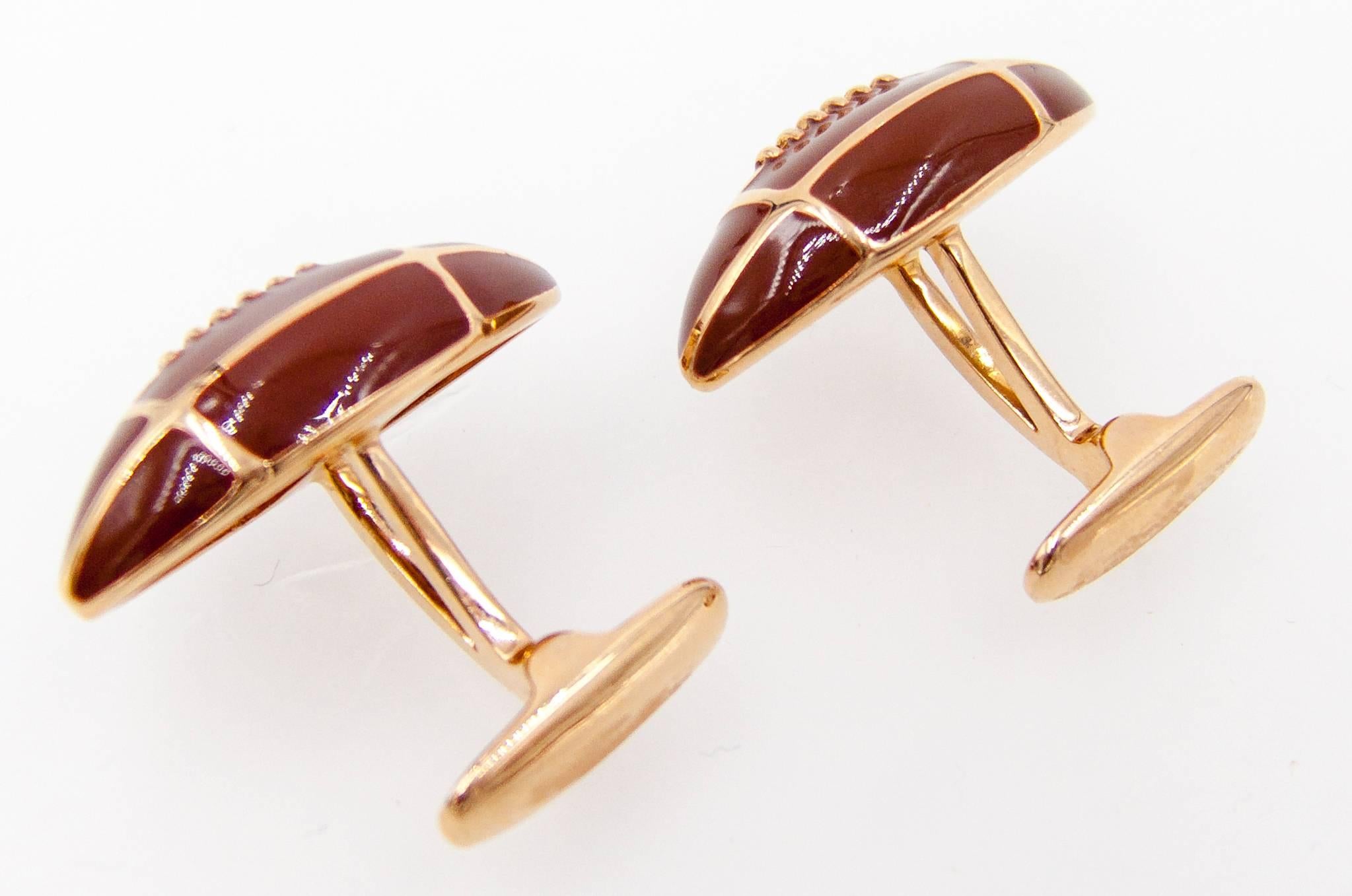 No matter which team you've bet on, these football cufflinks will remind the wearer of the game's excitement.   The footballs are carnelian colored enamel, and the other end easily slips through any buttonhole with the flip of its nicely engineered