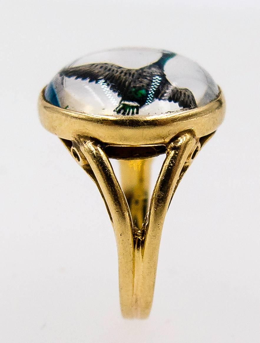 A charming little reminder of the Victorian era's interest in all things sporting, this lovely ring consists of a half crystal carved and painted on the inside and then set into the mount.   It's a size 5 but can be sized up or down as needed.  