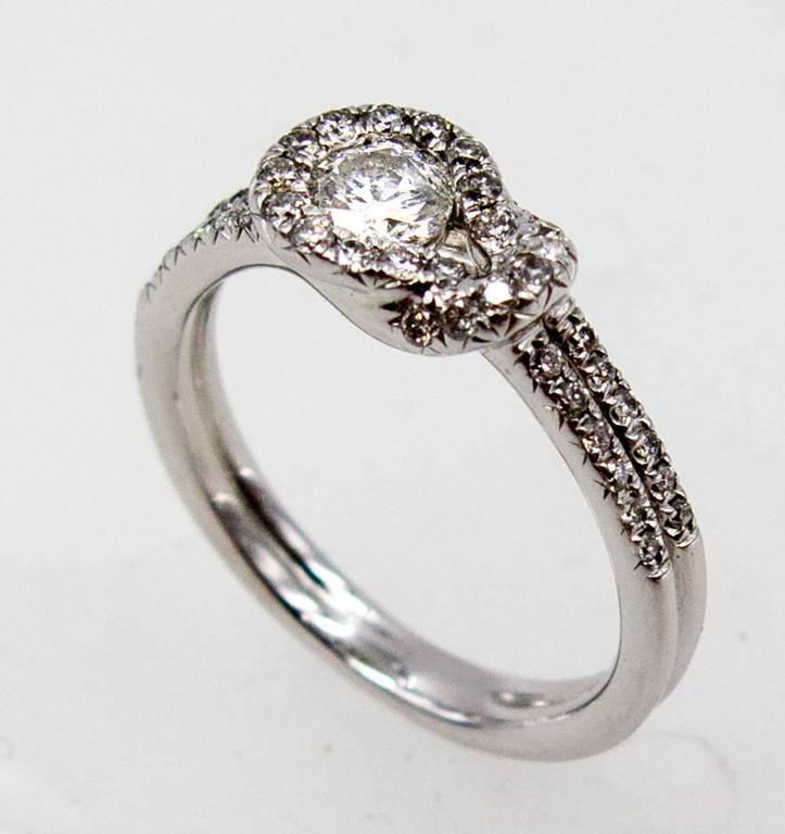 Elegant Diamond Platinum Mount Hercules Knot Ring For Sale at 1stDibs