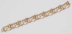 Bracelet en perles d'or pour chevaux de concours
