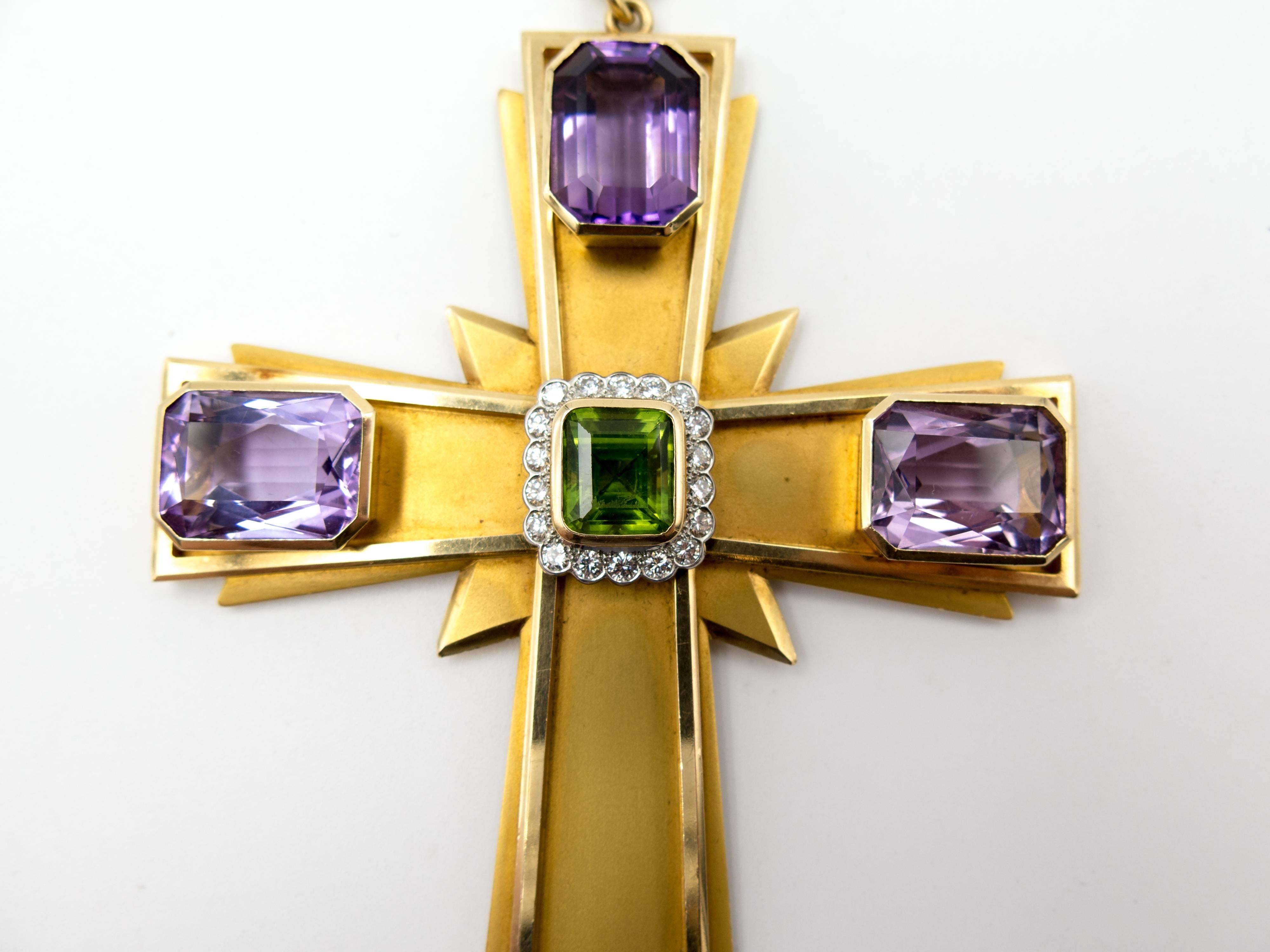 An exceptionally unusual and surprisingly wearable cross pendant from the Canadian maison Birks,( established in 1879), prominent designers, manufacturers, and retailers of unique jewelry.   This eye-catching cross measures 3" wide and 4