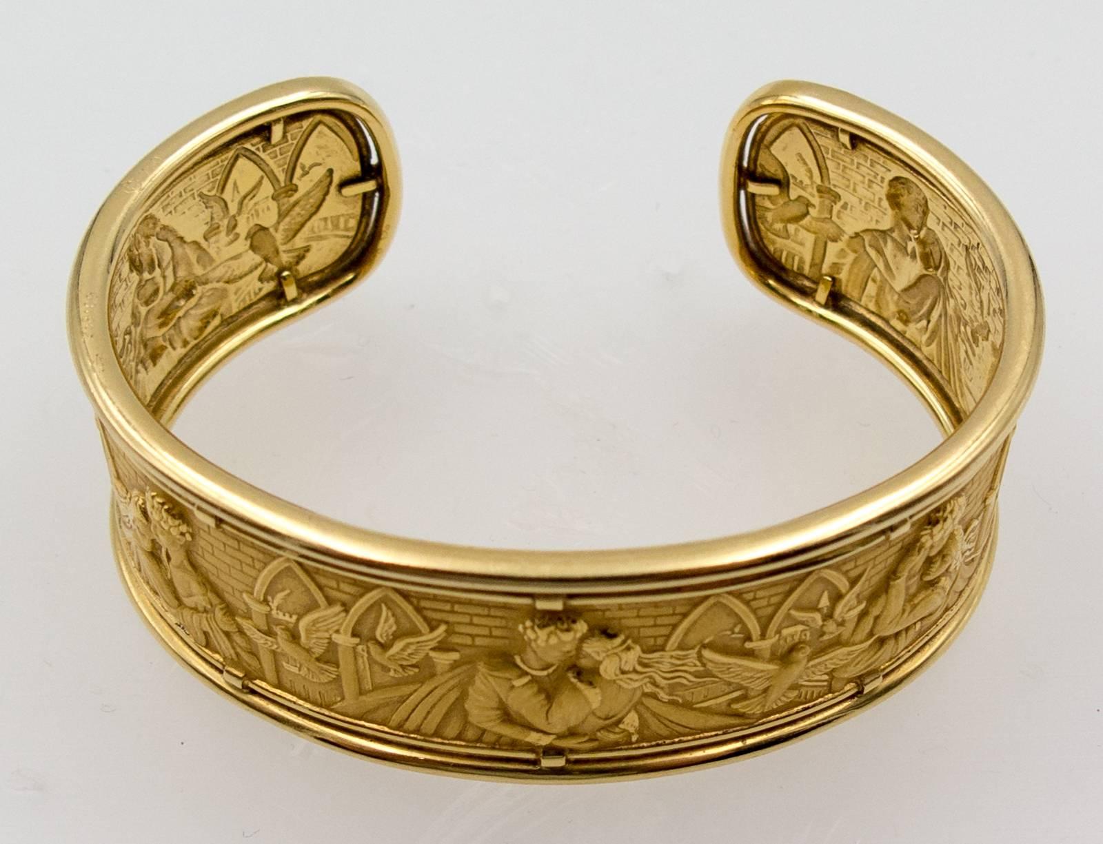 A delightfully romantic cuff bracelet recounting the story of Romeo and Juliet intricately carved into richly pigmented 18 karat yellow gold.  Displaying the precision and attention to detail in all Carrera y Carrera jewels, this elegant cuff