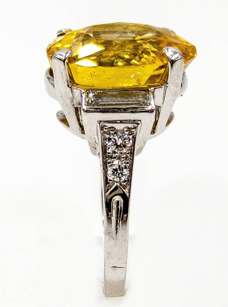    A one-of-a-kind and spectacular ring, this Tiffany & Co ring is definitely for the astute collector.   A brilliant and sparkling yellow sapphire weighing 10.81 carats has been submitted to the Gemological Institute of America and has been